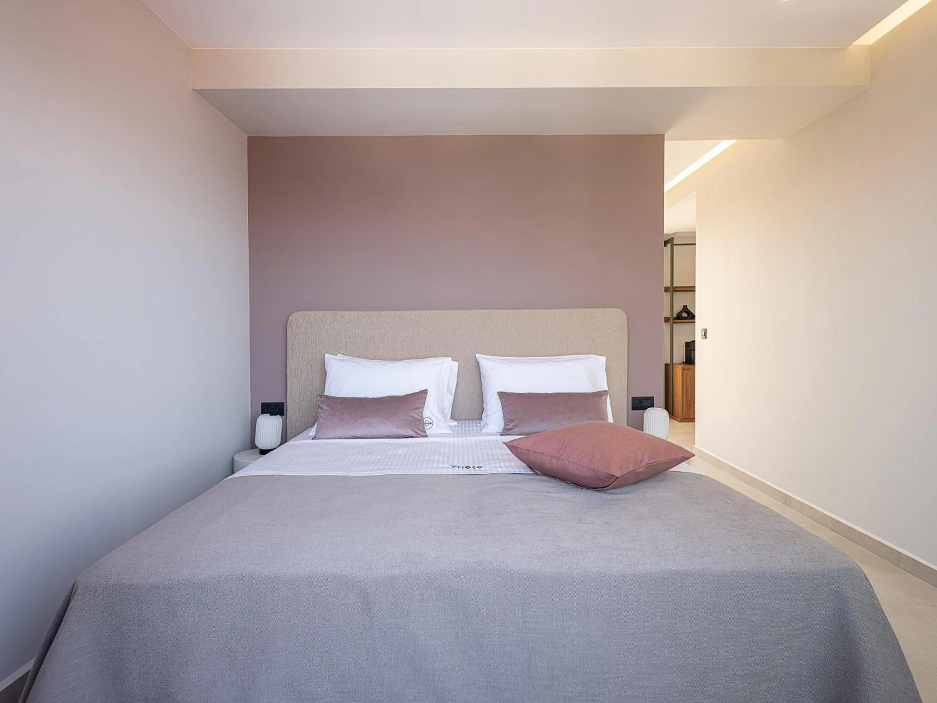 Bed in Theta Boutique Hotel