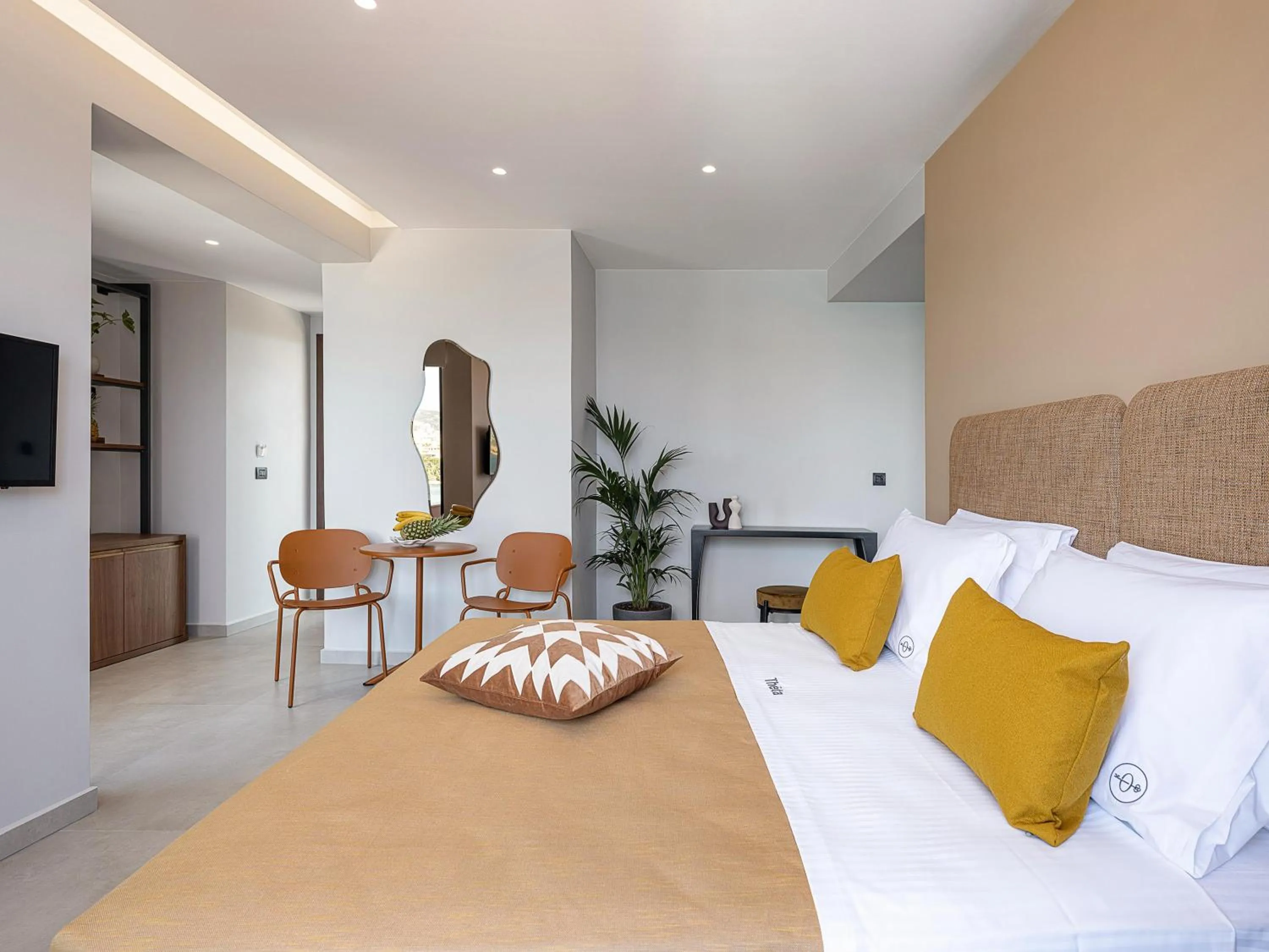 Bed in Theta Boutique Hotel