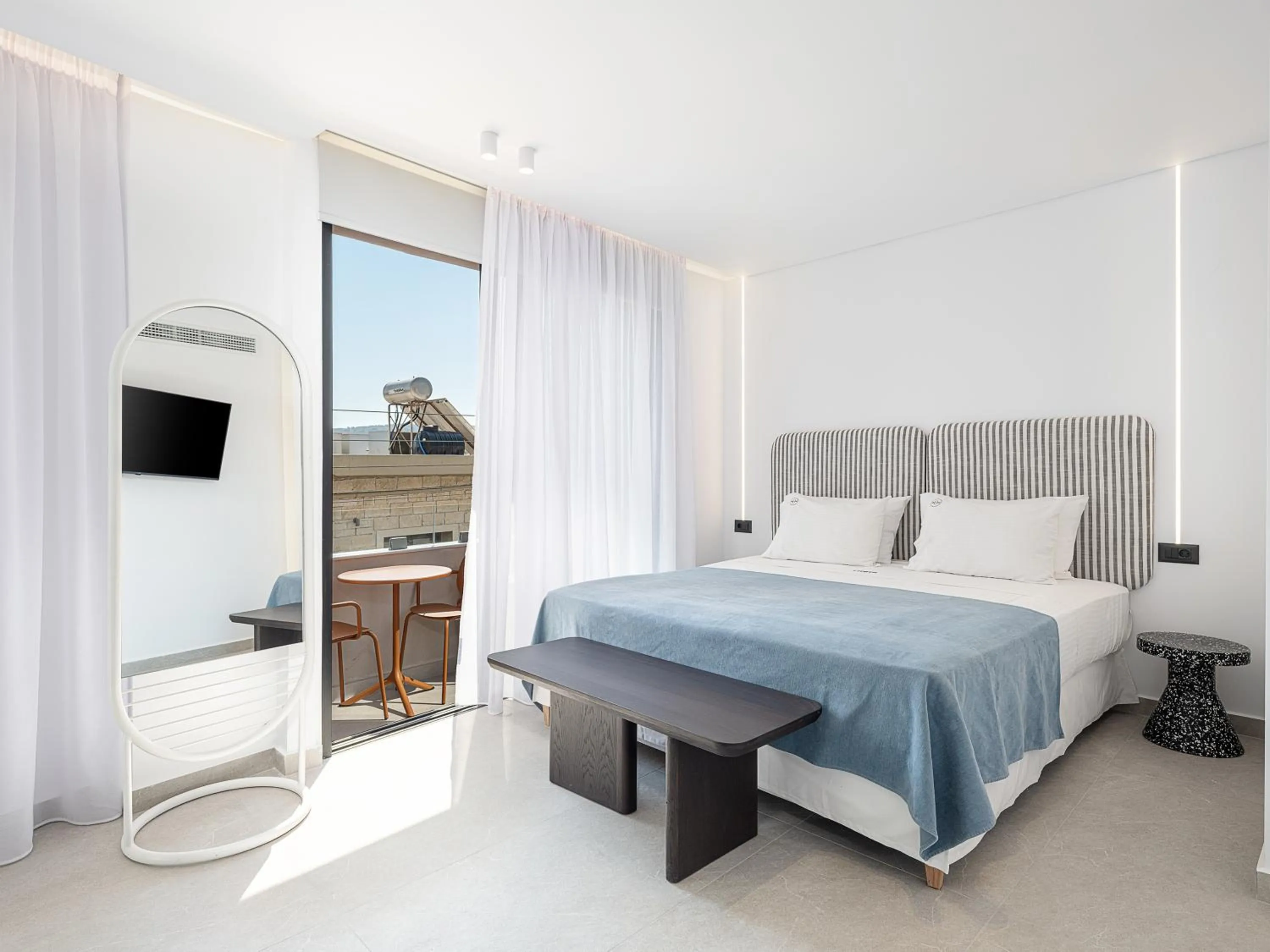 Bed in Theta Boutique Hotel