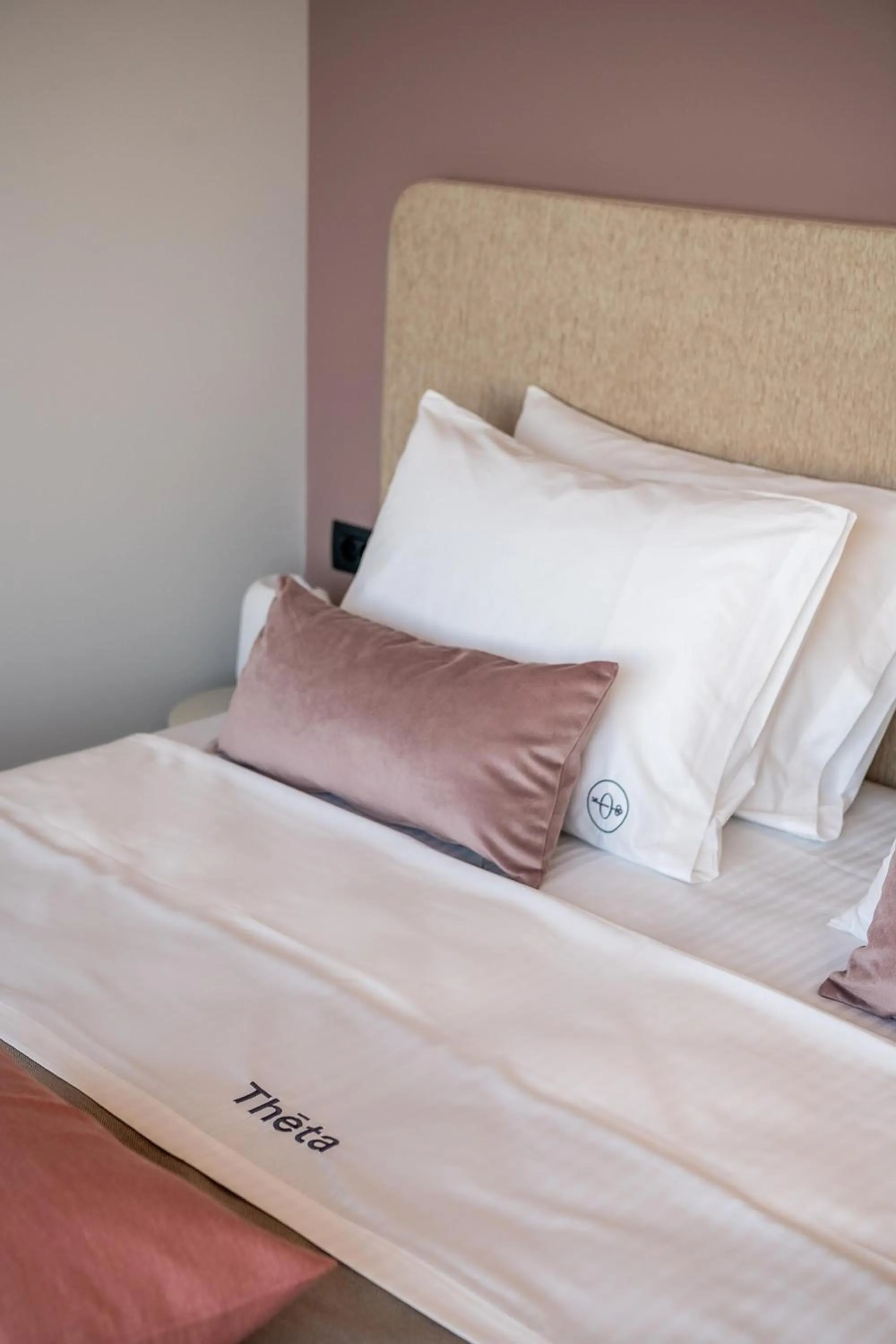 Bed in Theta Boutique Hotel