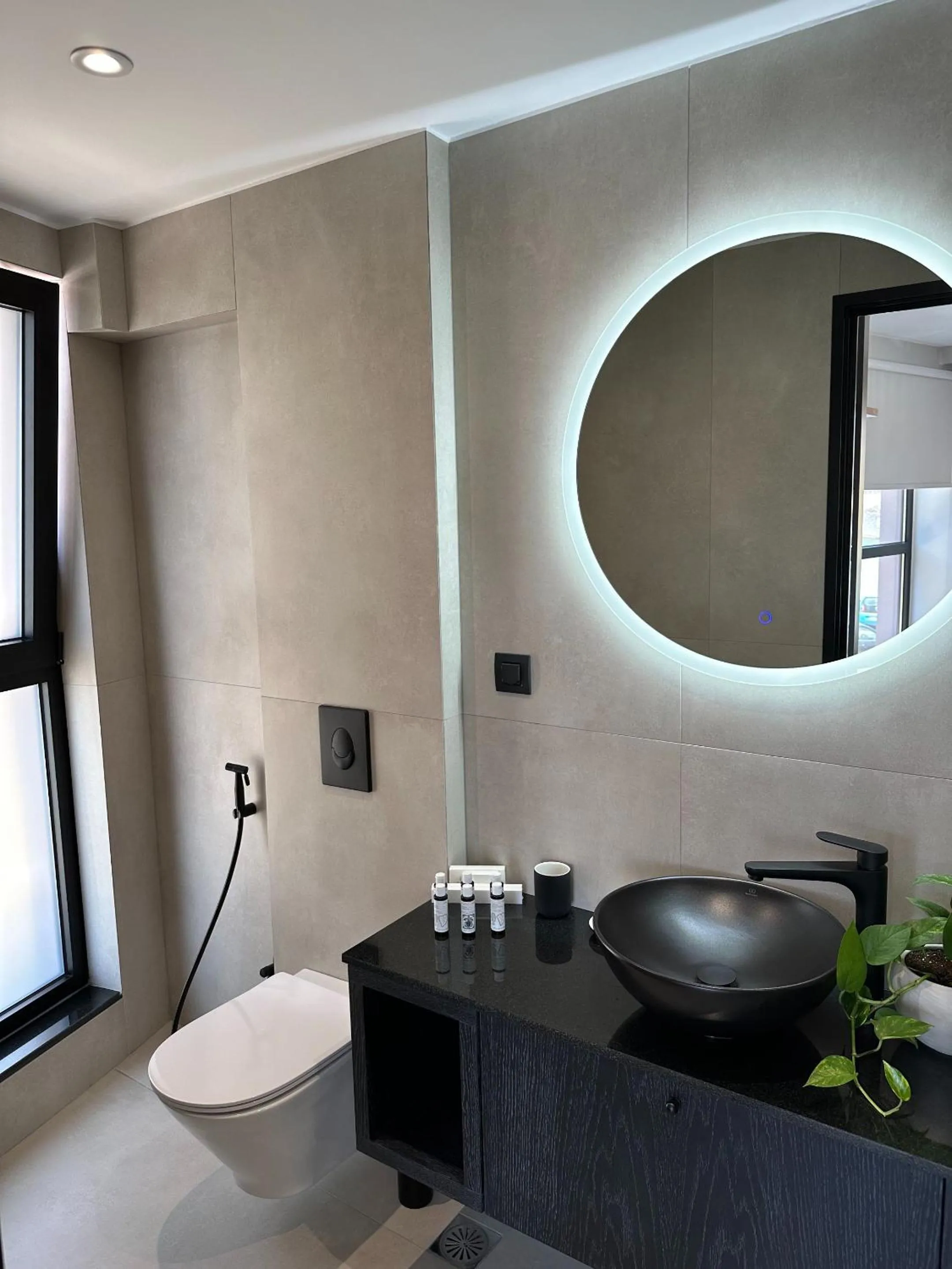 Toilet in Theta Boutique Hotel