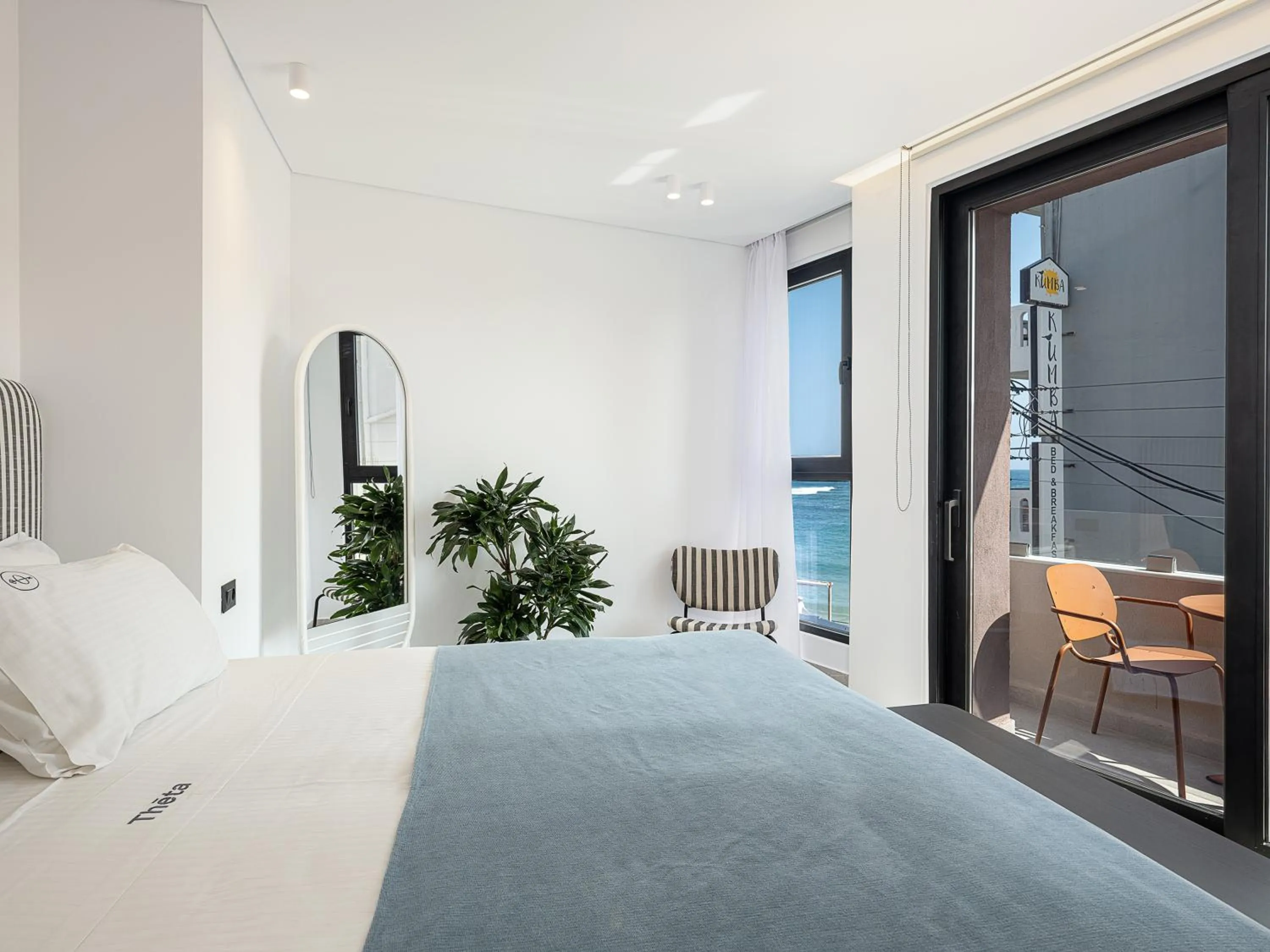 Bed in Theta Boutique Hotel