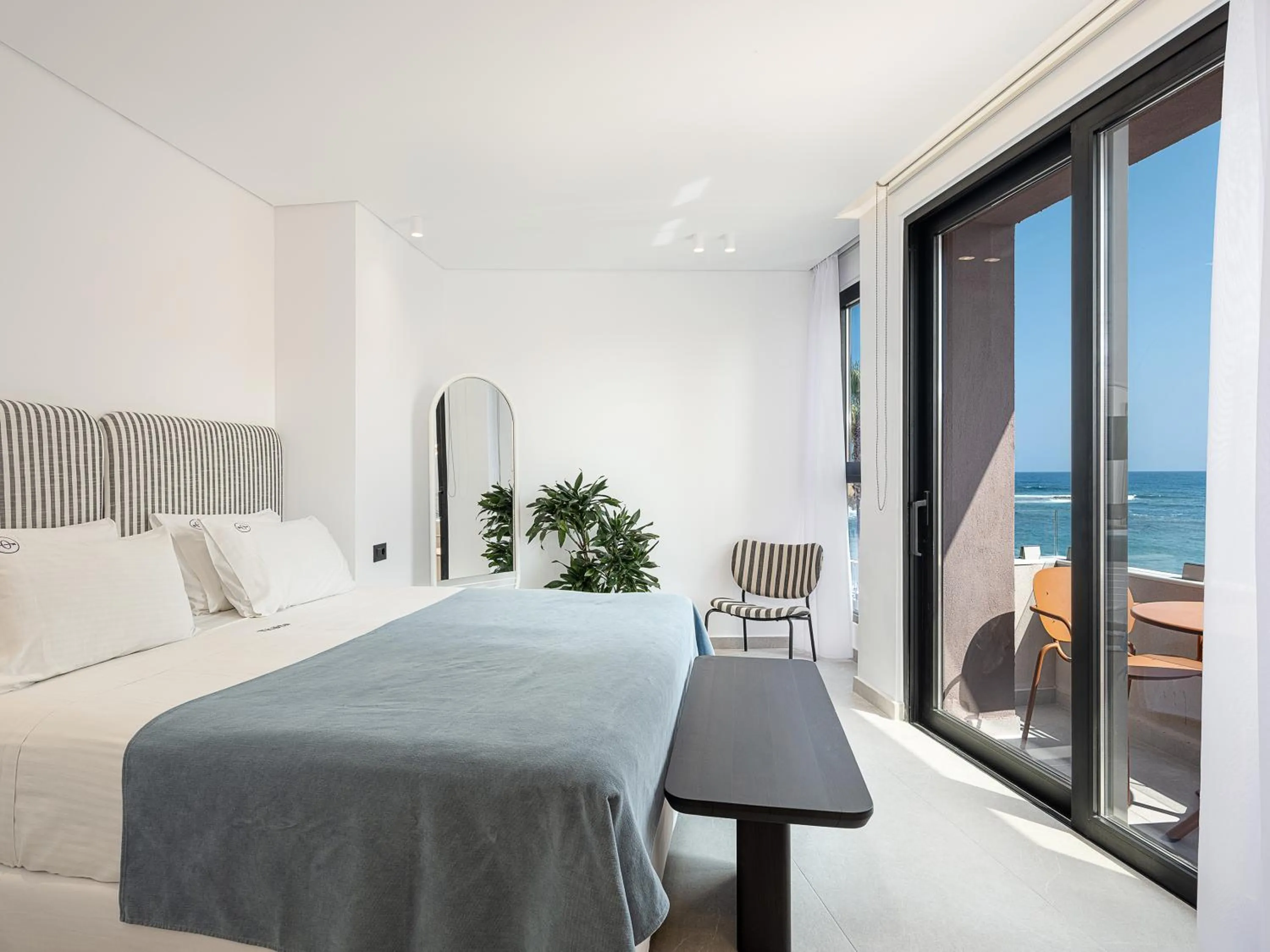 Bed in Theta Boutique Hotel