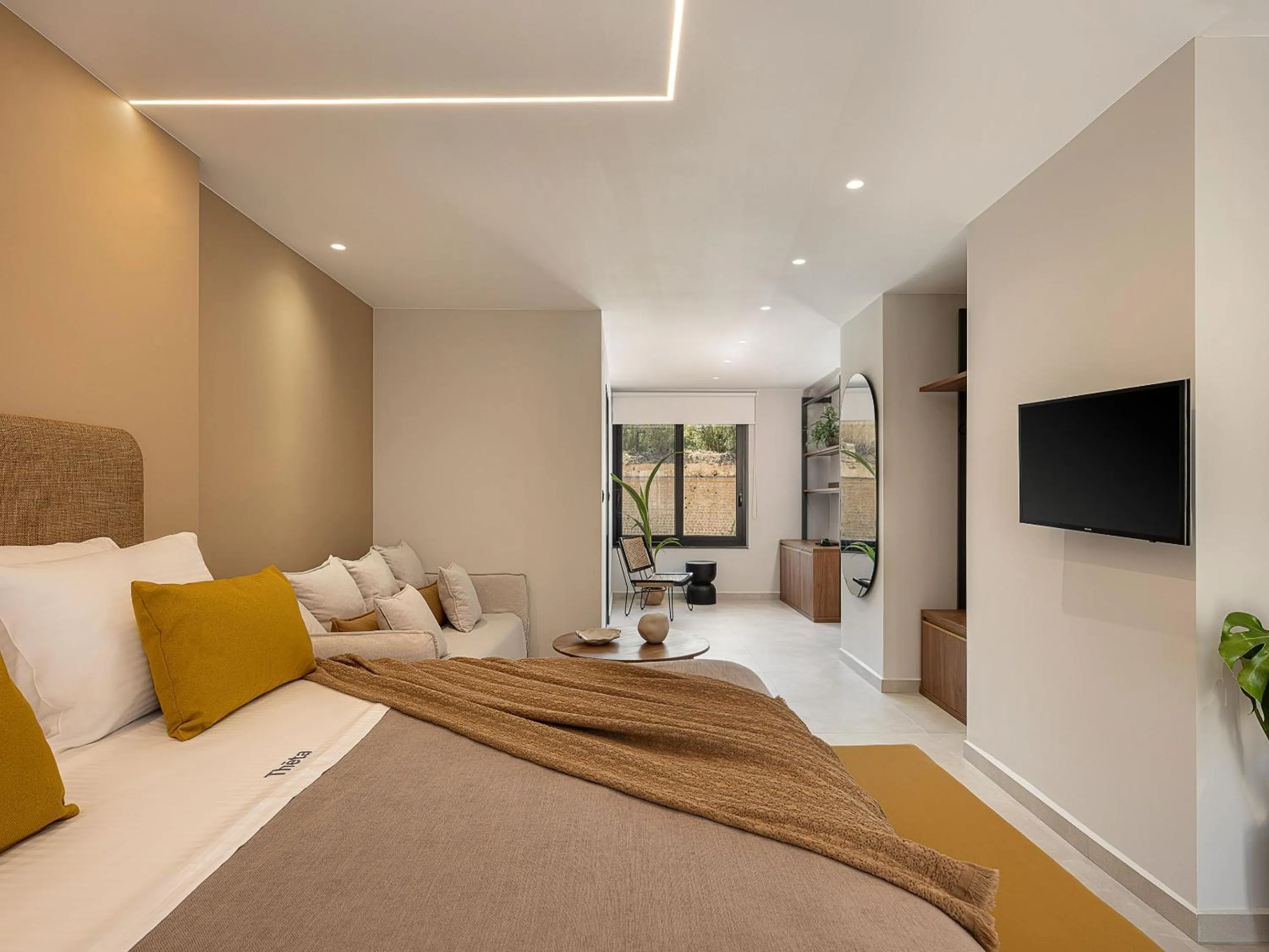 Bed in Theta Boutique Hotel