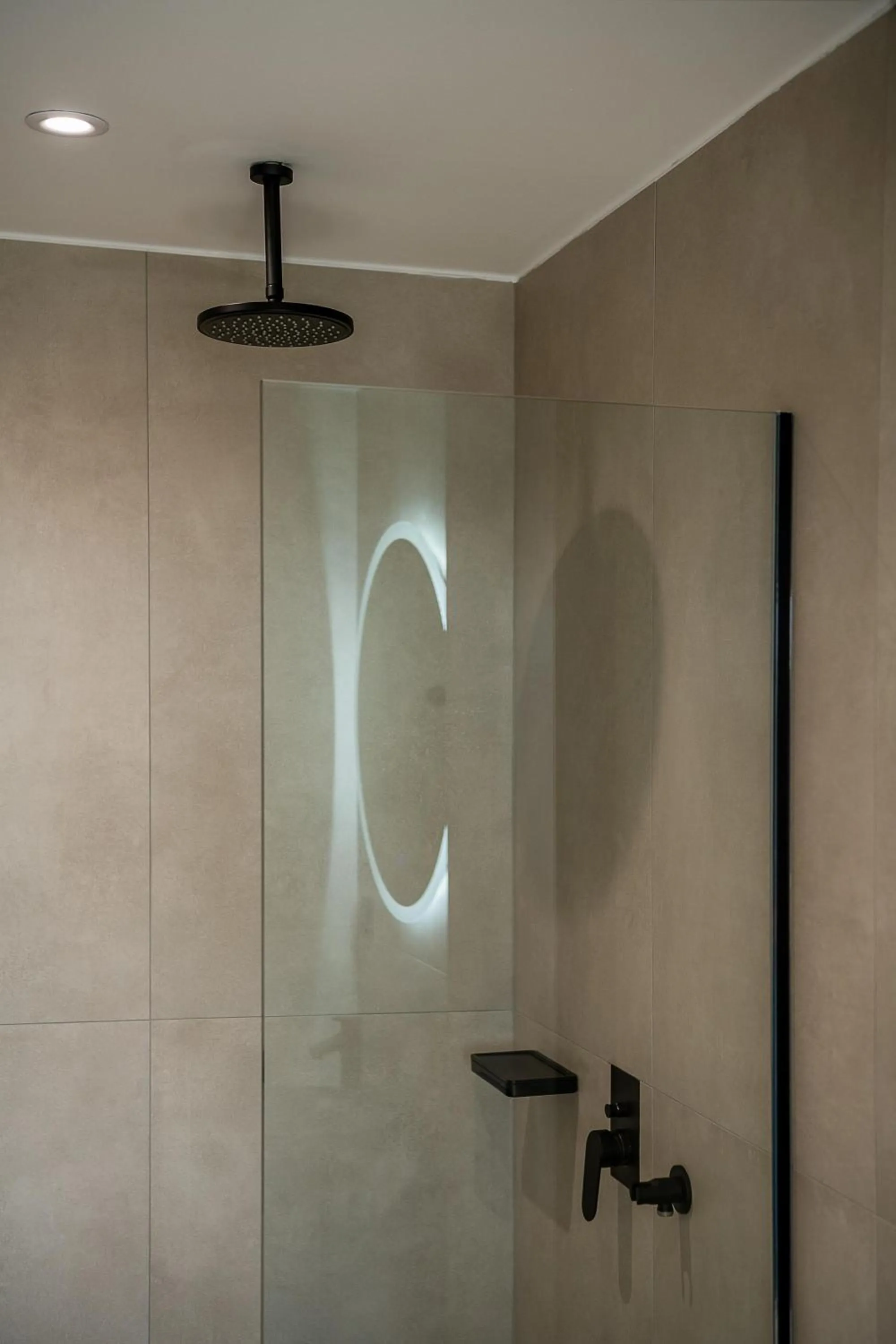 Shower in Theta Boutique Hotel