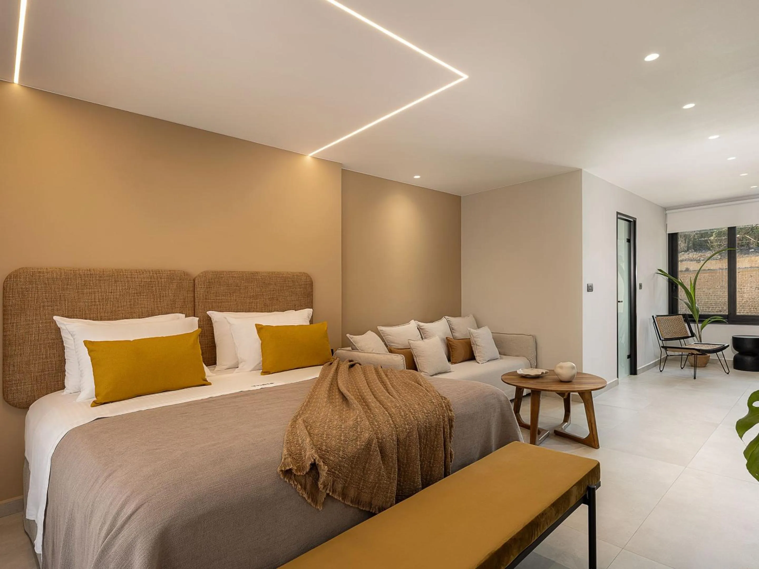 Bed in Theta Boutique Hotel