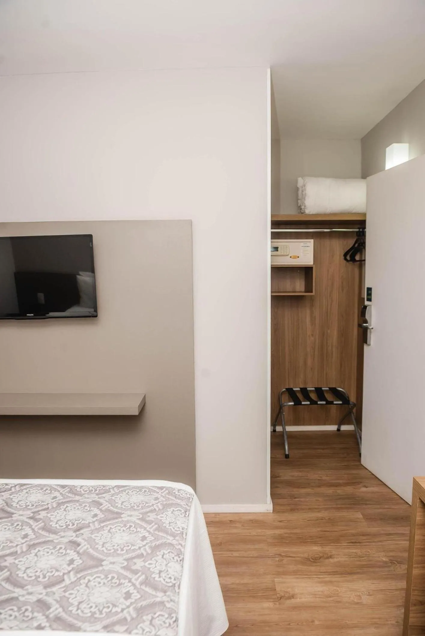 Bed in Ímpar Suítes Expominas