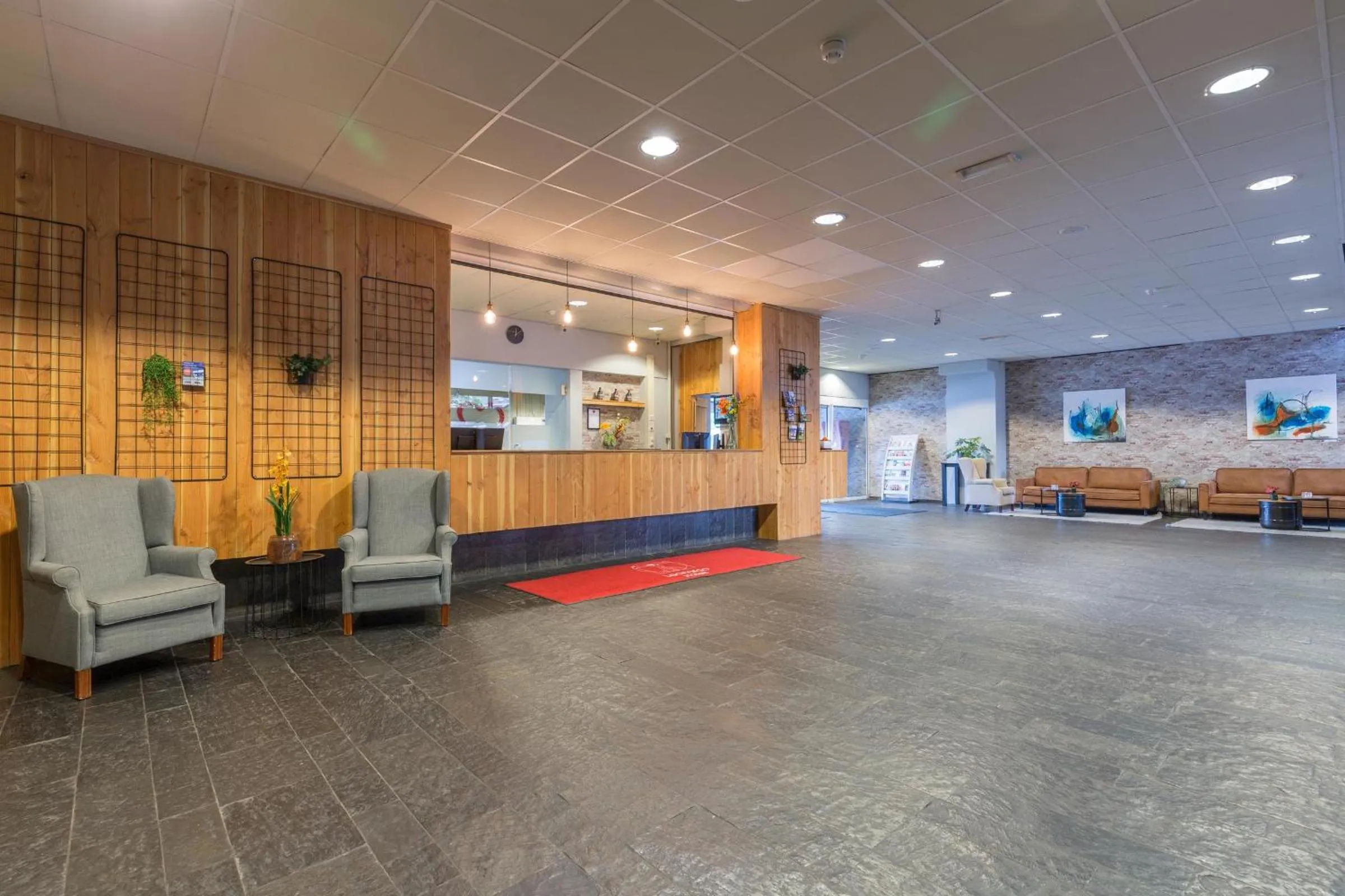 Lobby or reception in Leonardo Hotel Lelystad City Center