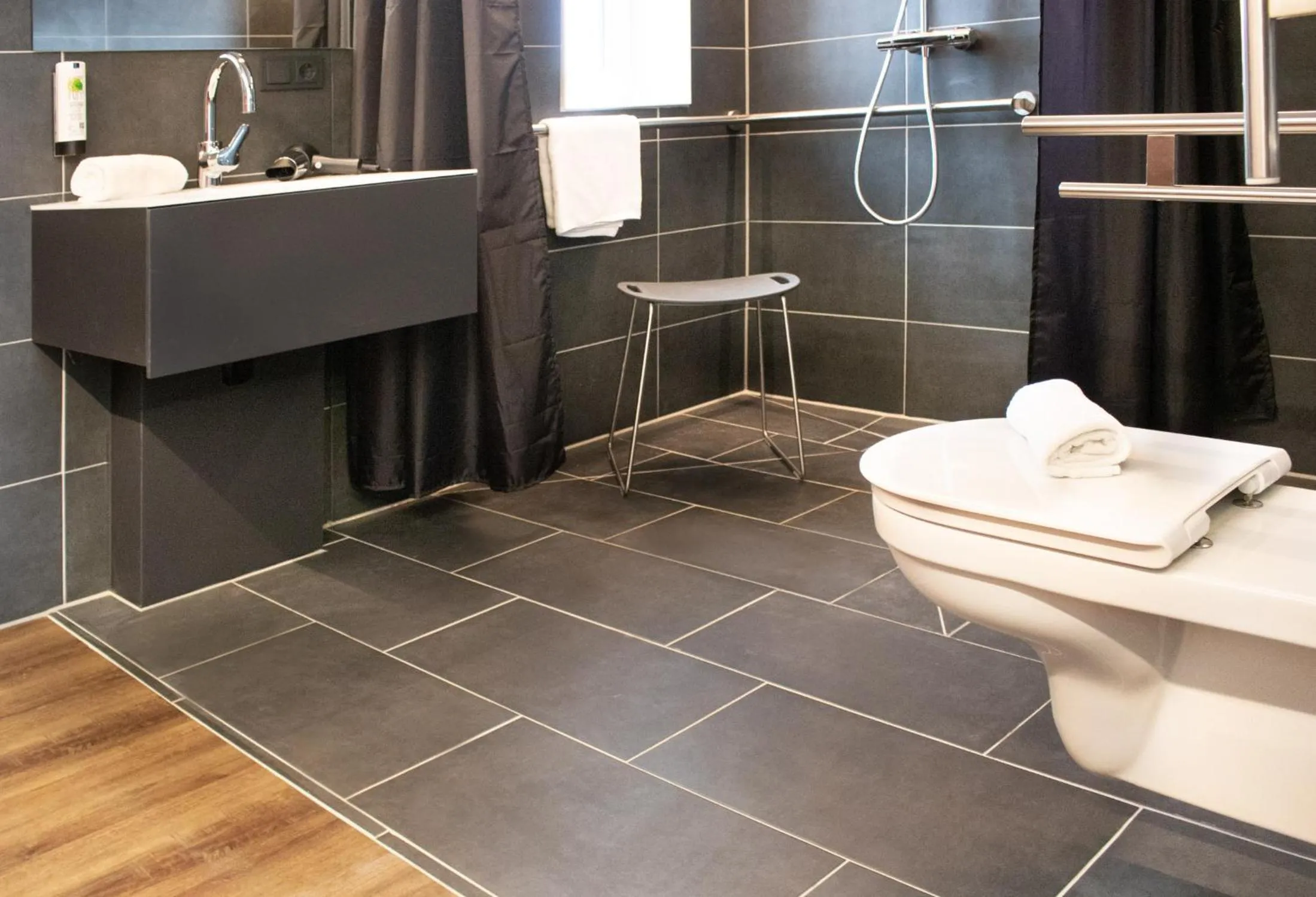 Toilet in HBS Hotel by WMM Hotels