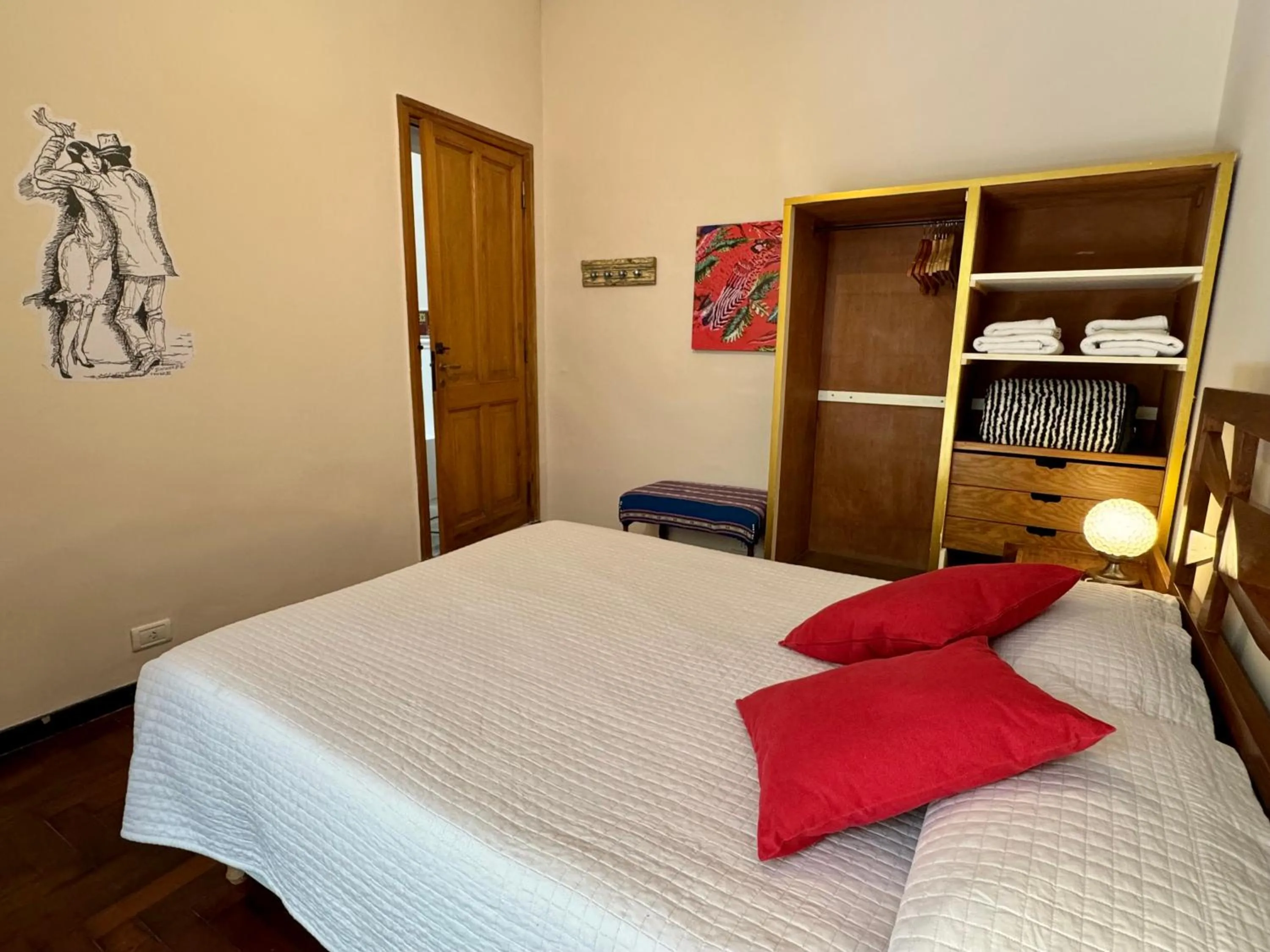 Bed in Lina's Tango Guesthouse