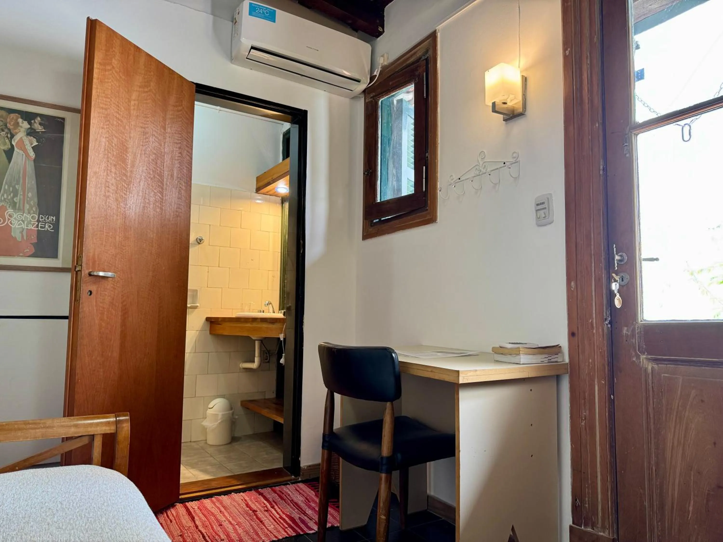 Bathroom, Bed in Lina's Tango Guesthouse