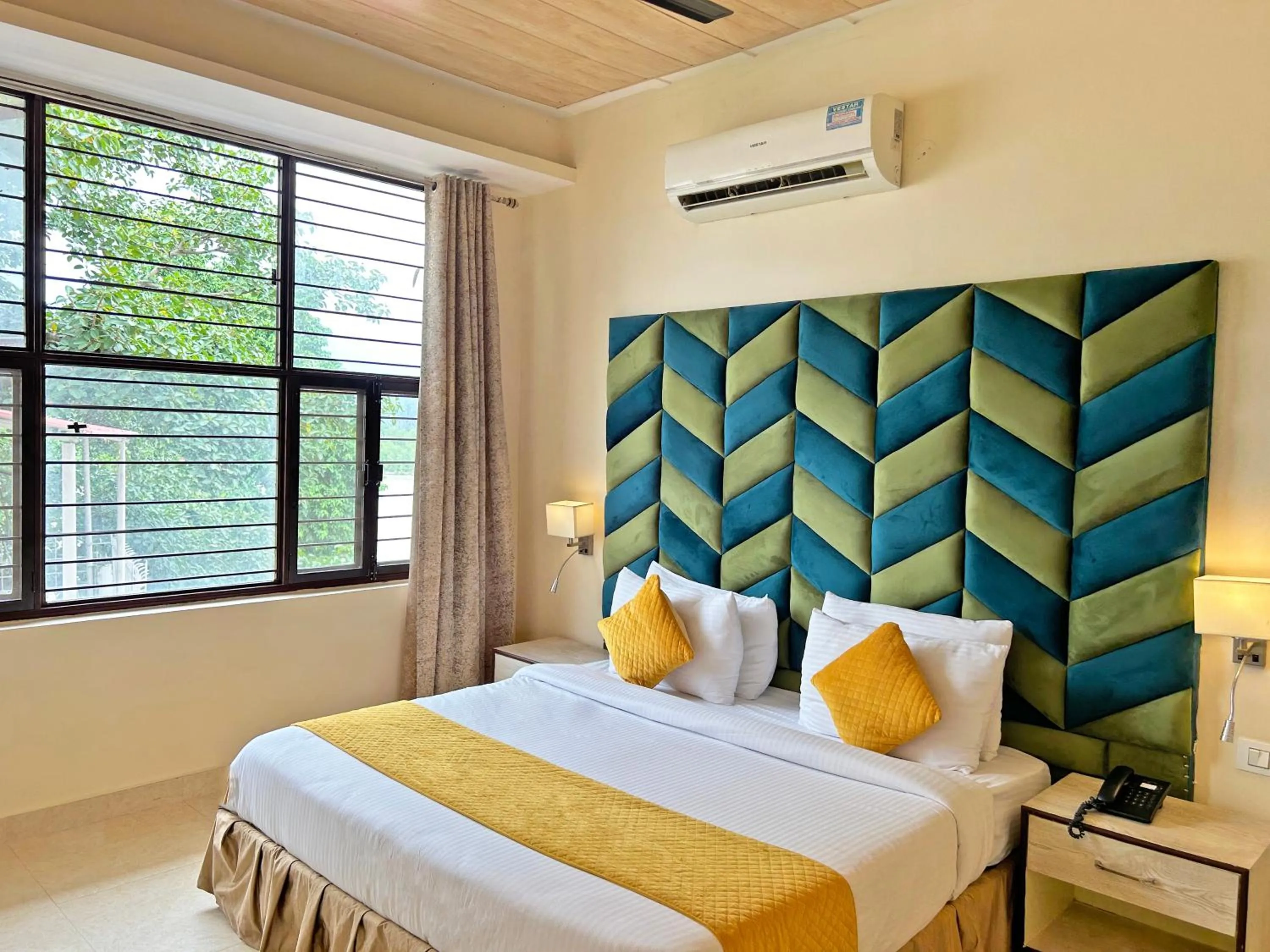 Bed in The Neeraj Naturecure - Ganga View