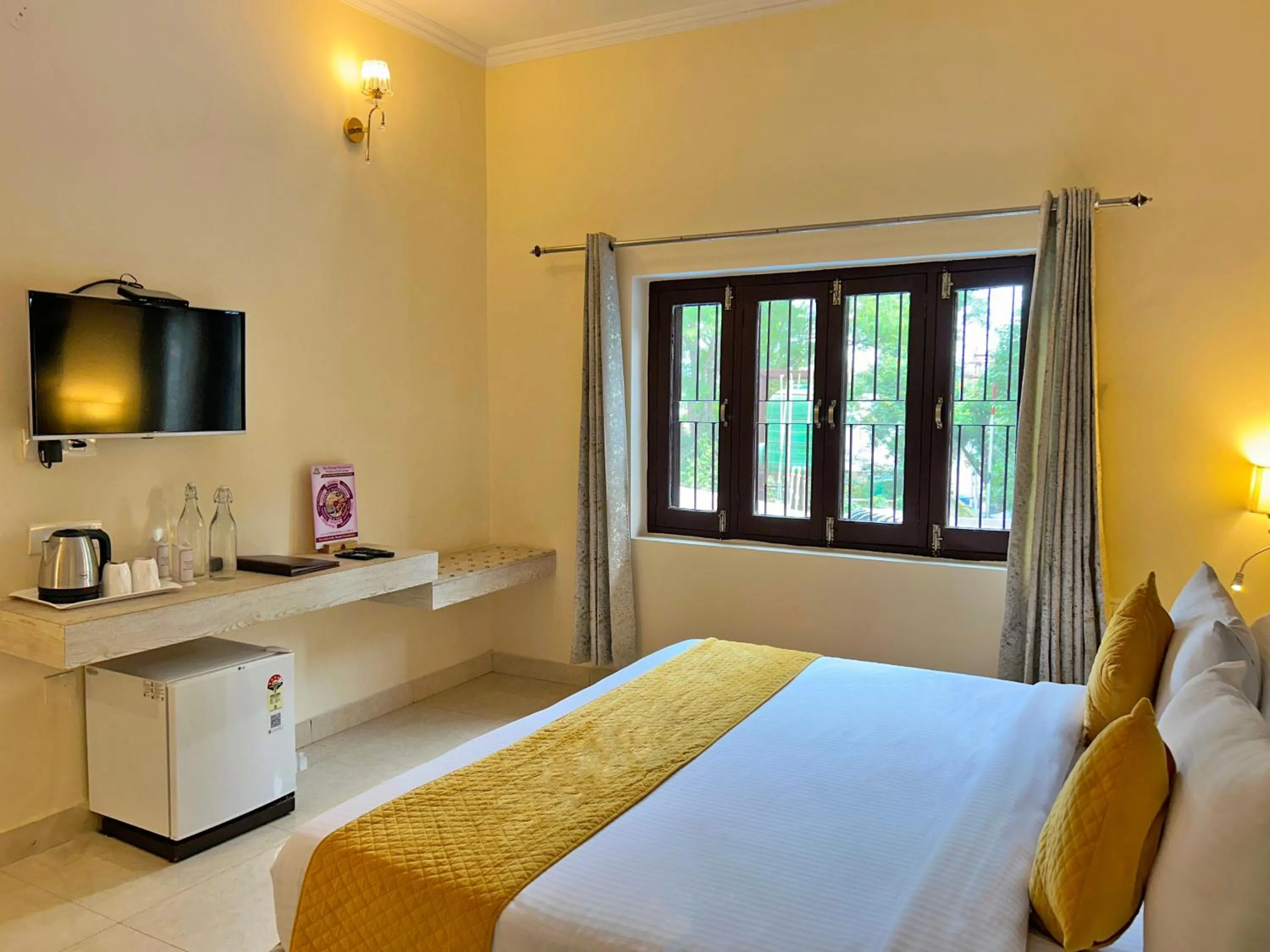 Bed in The Neeraj Naturecure - Ganga View