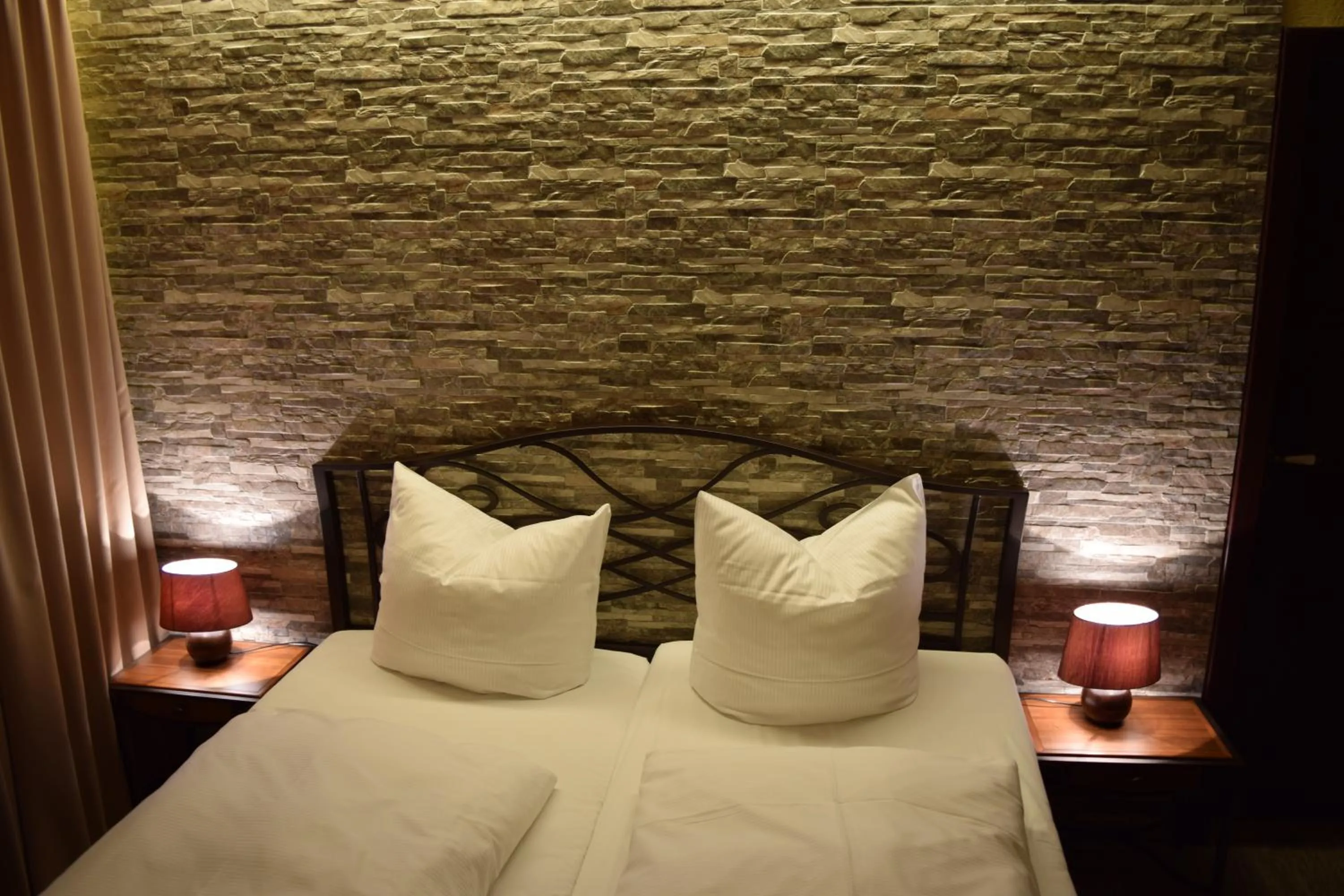 Decorative detail, Bed in Hotel Arte Vida OHG