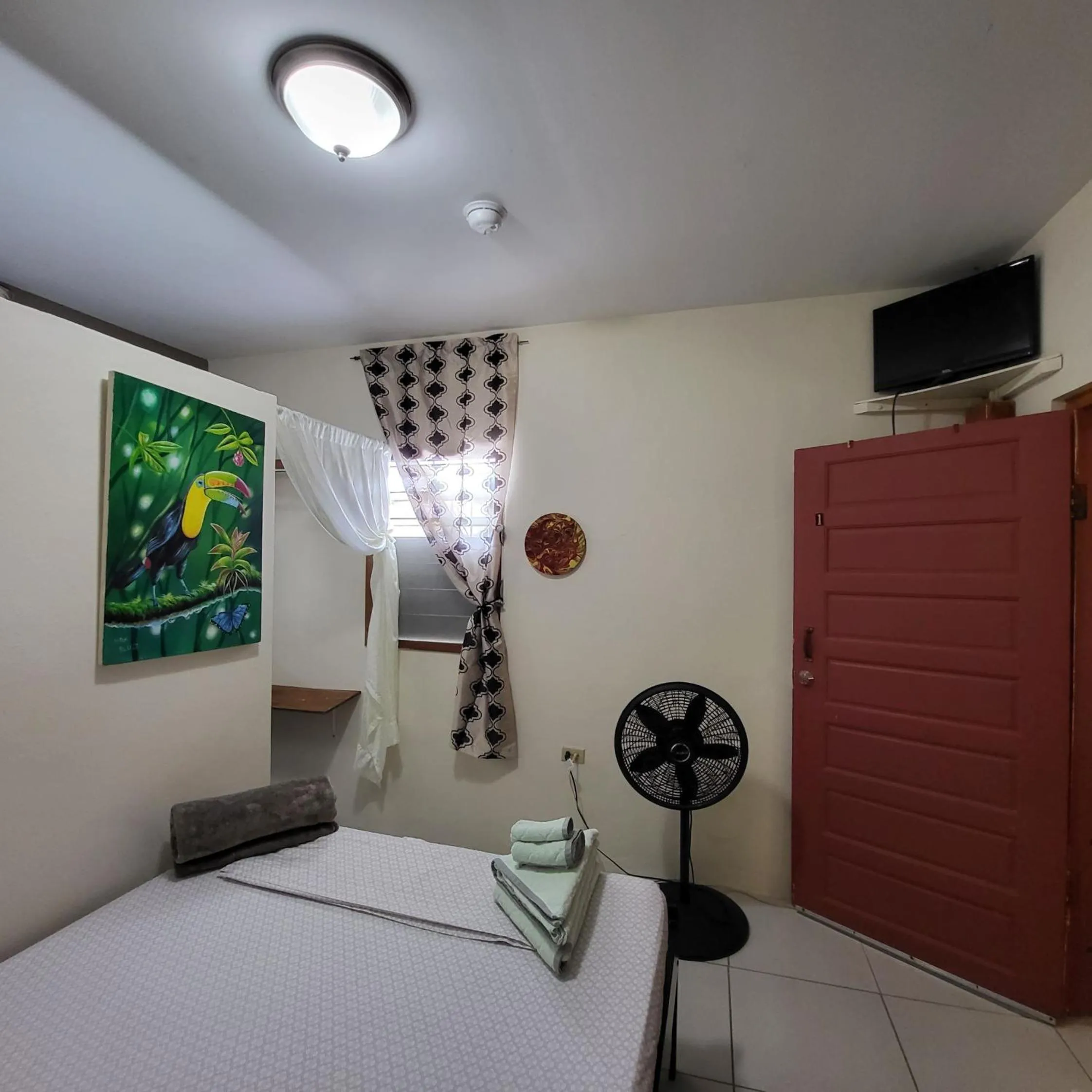 TV and multimedia, Bed in Hacienda Tropical Guest House
