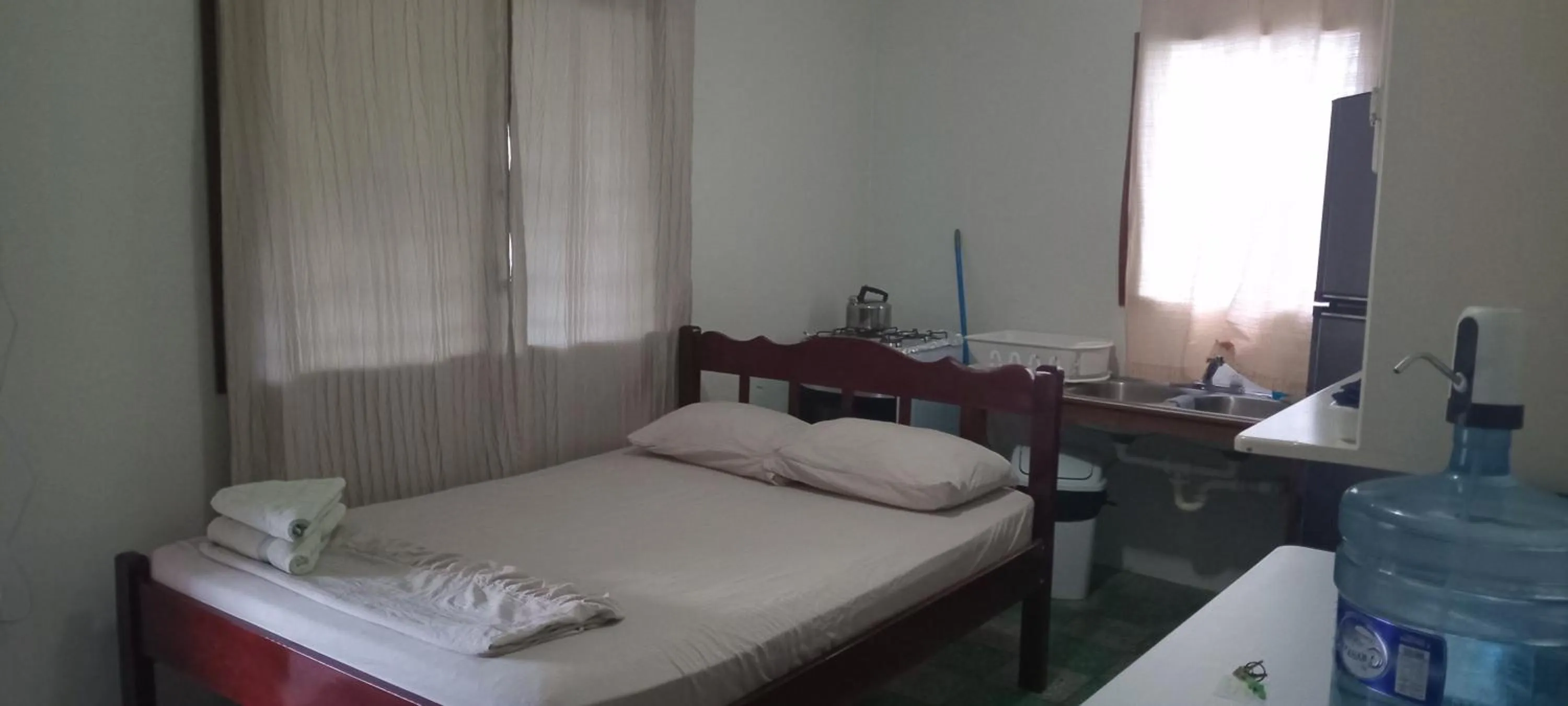 Bed in Hacienda Tropical Guest House