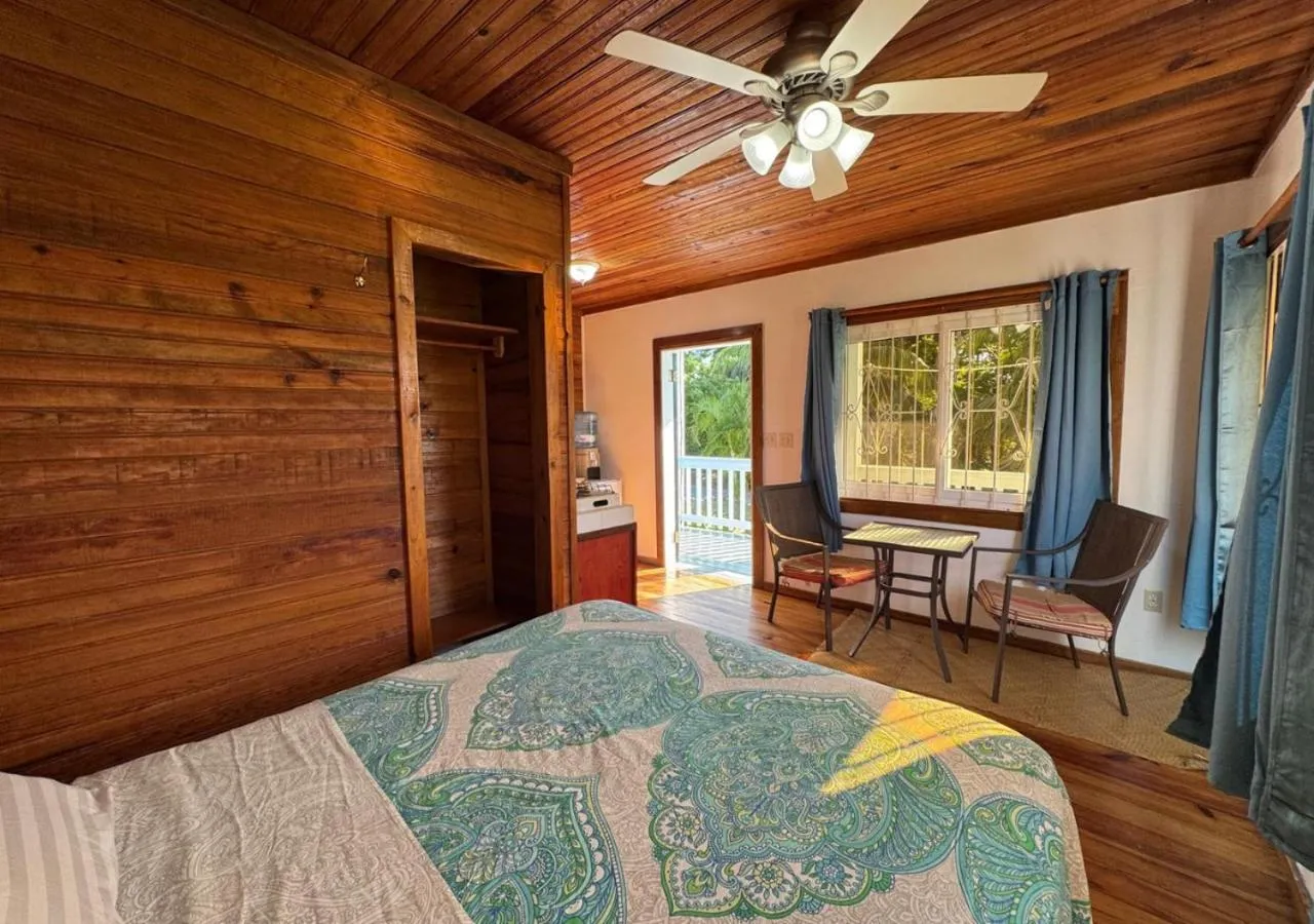 Balcony/Terrace, Bed in Guava Grove Resort & Villas