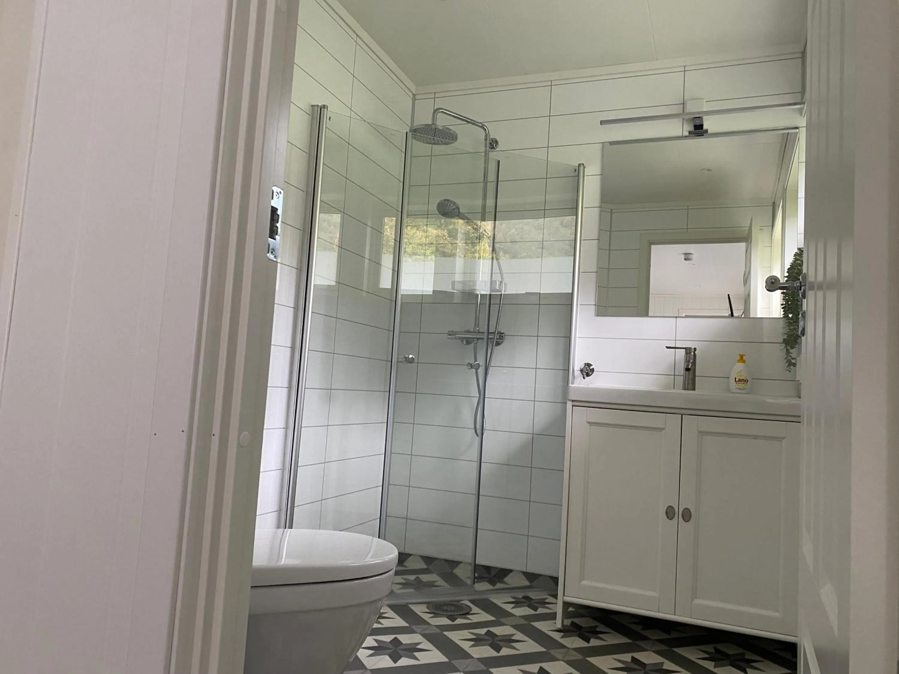 Shower in Rosendal Apartments Motellet