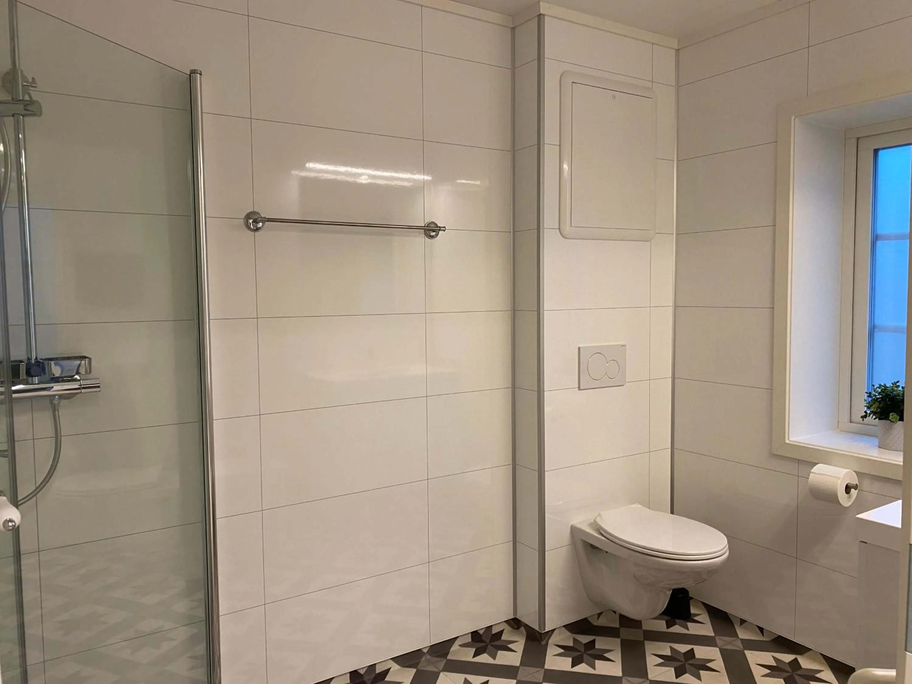 Shower in Rosendal Apartments Motellet