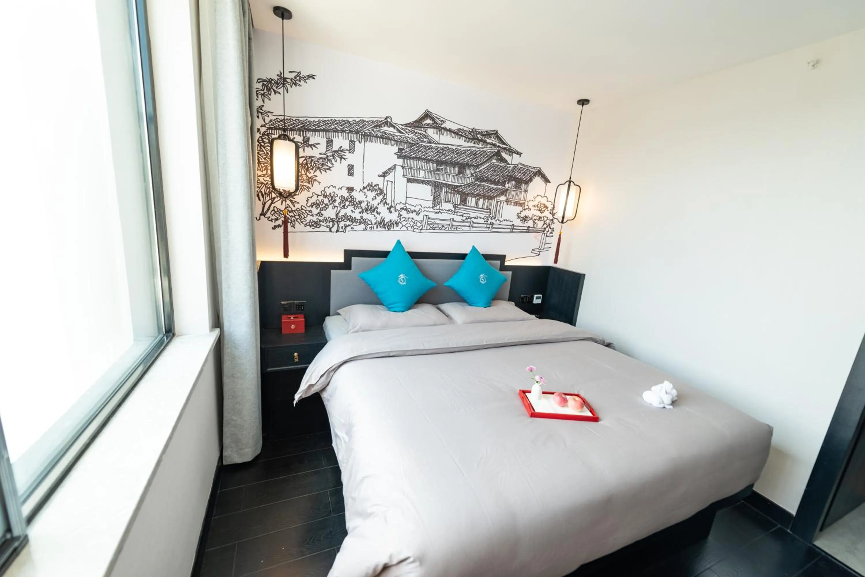 Bed in Gong Xili Qingdu Hotel