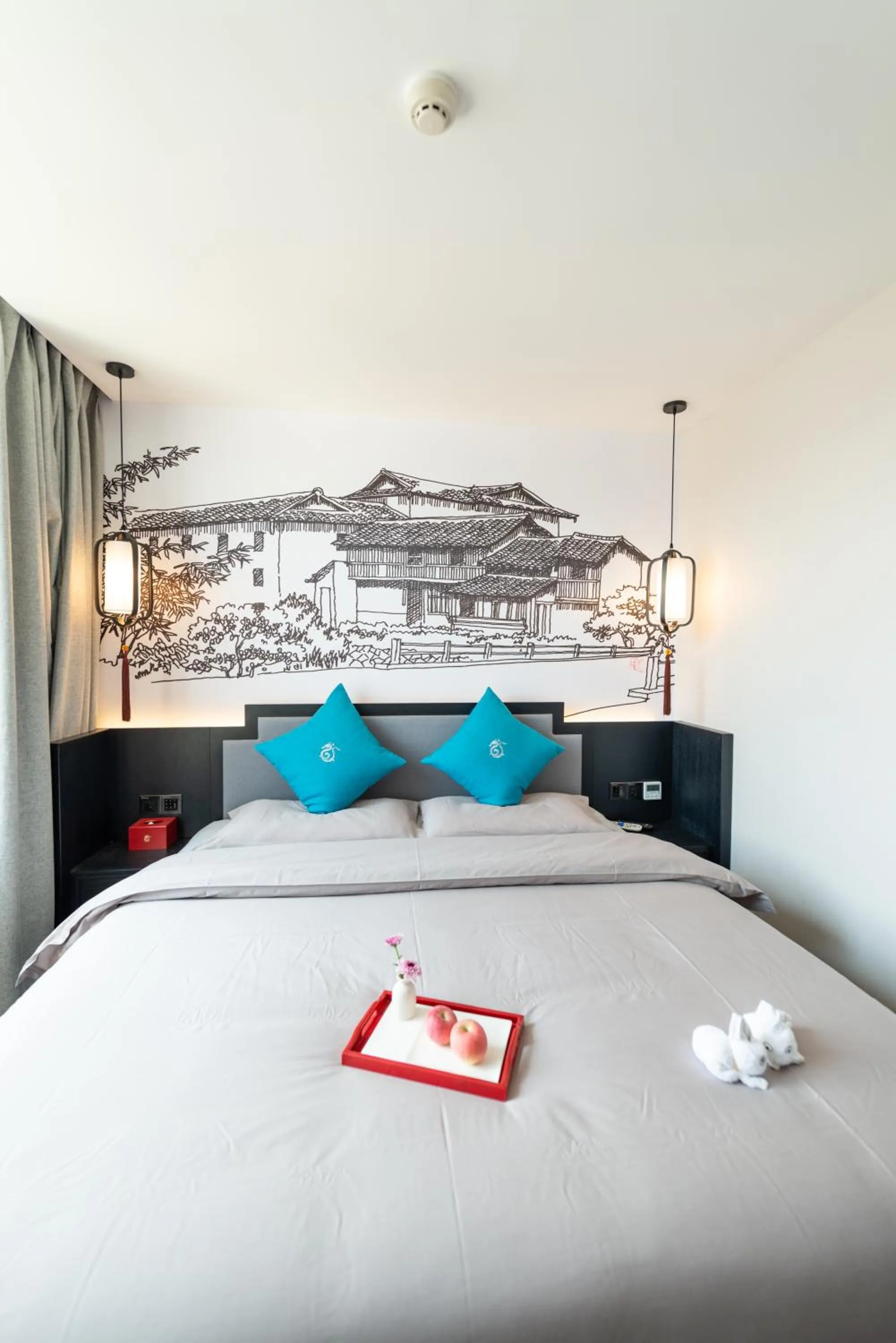 Bed in Gong Xili Qingdu Hotel