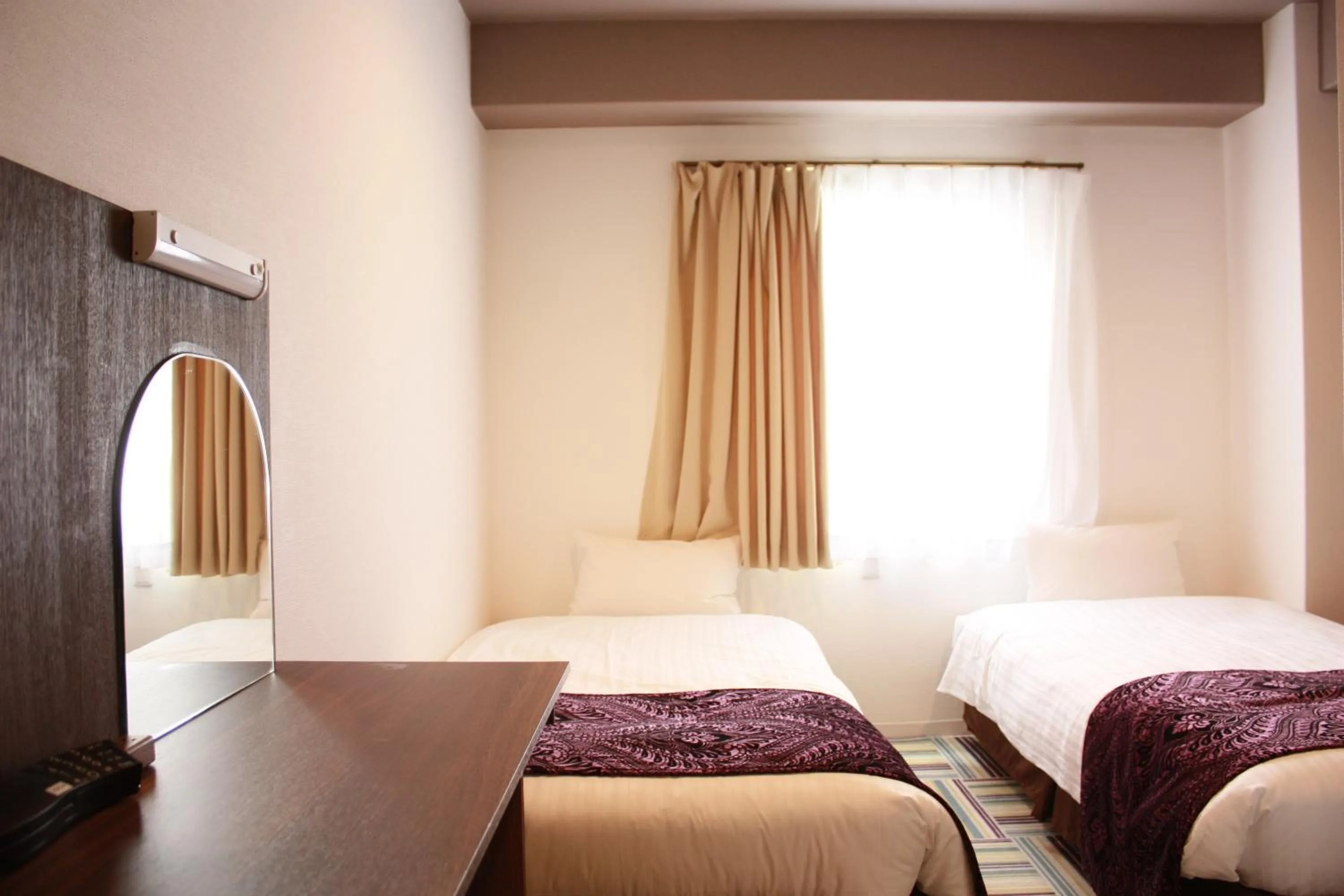 Bed in Hotel LiVEMAX Umeda Central