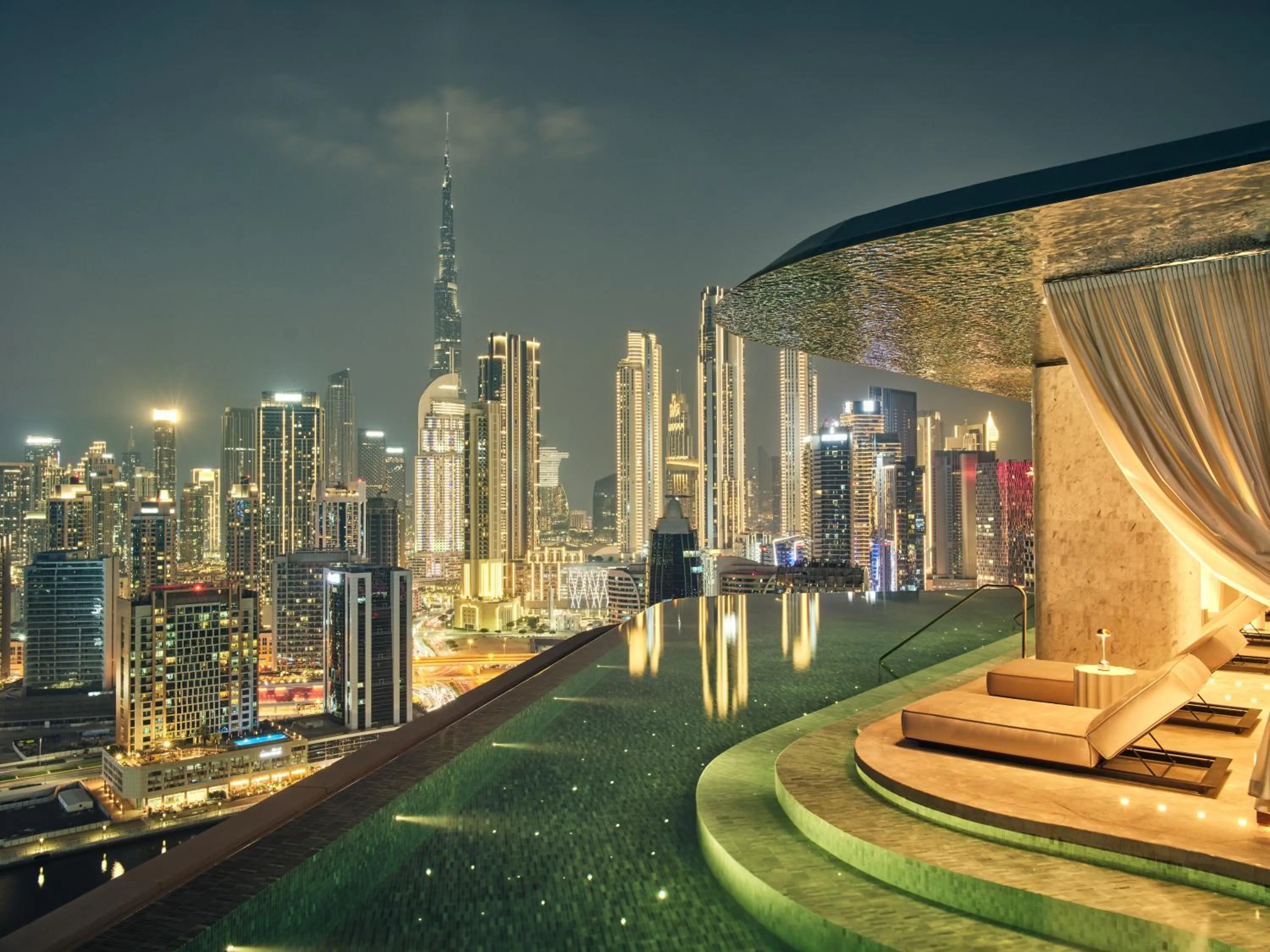 Pool view in The Lana - Dorchester Collection