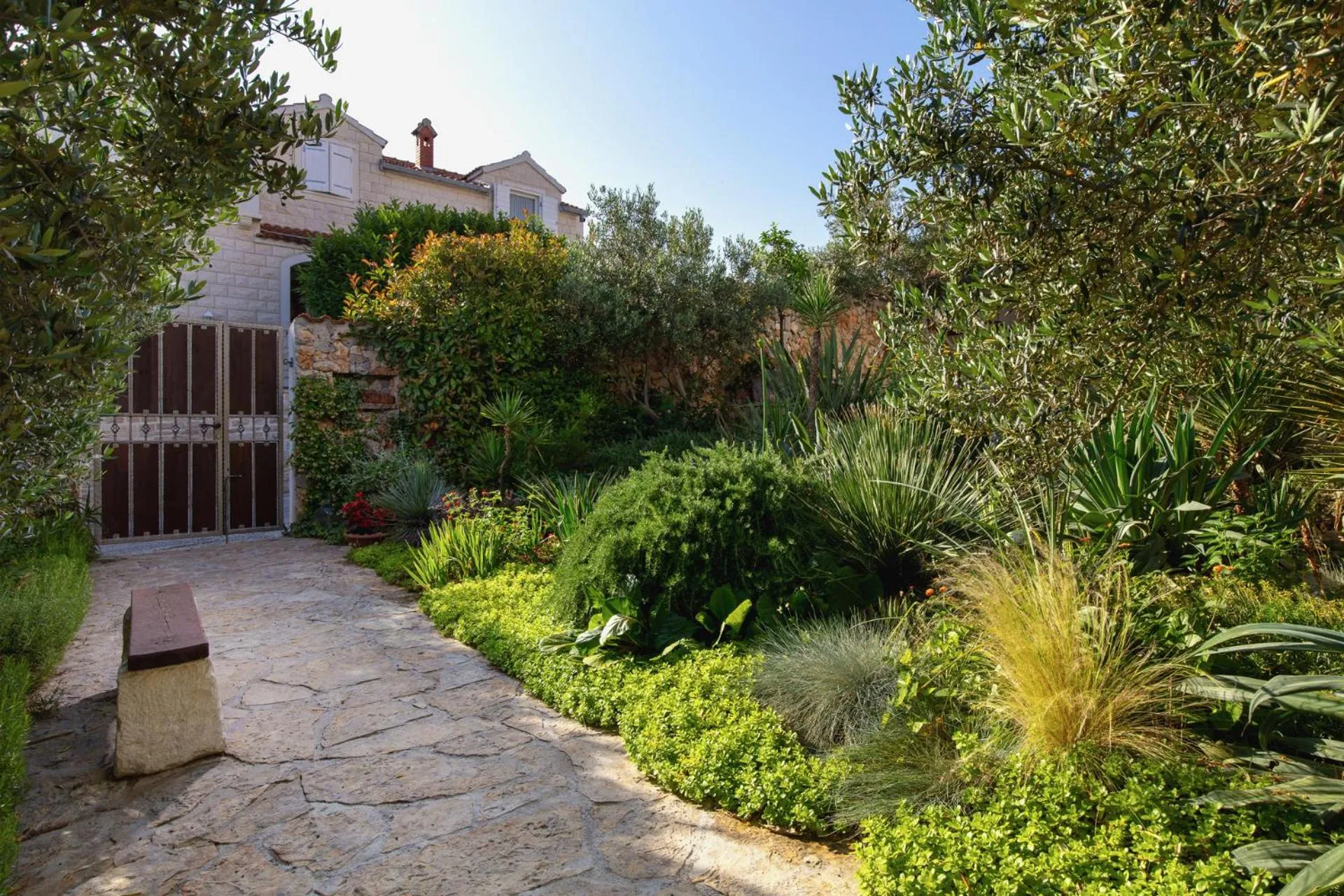 Garden in Holiday Home Lukrecia, for 9, private pool, free parking, 450 m from the beach