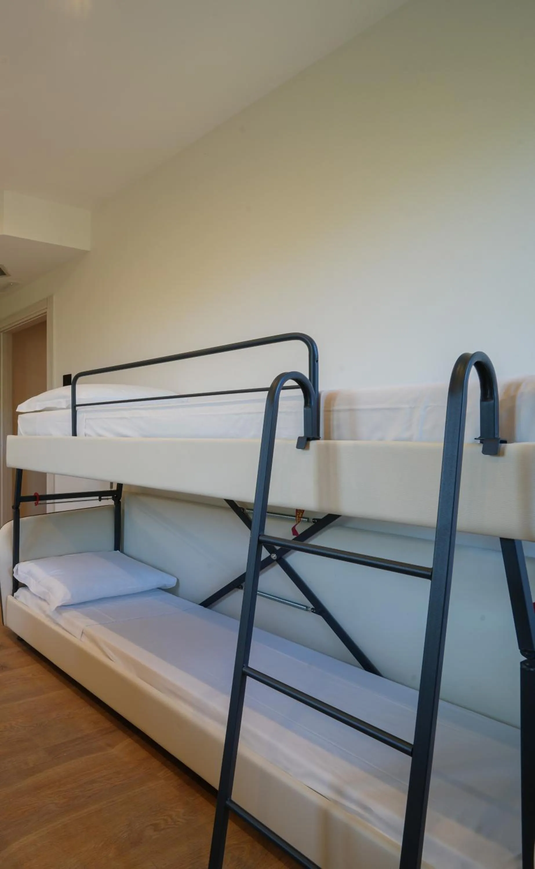 Bed in Hotiday Castiglioncello Suite