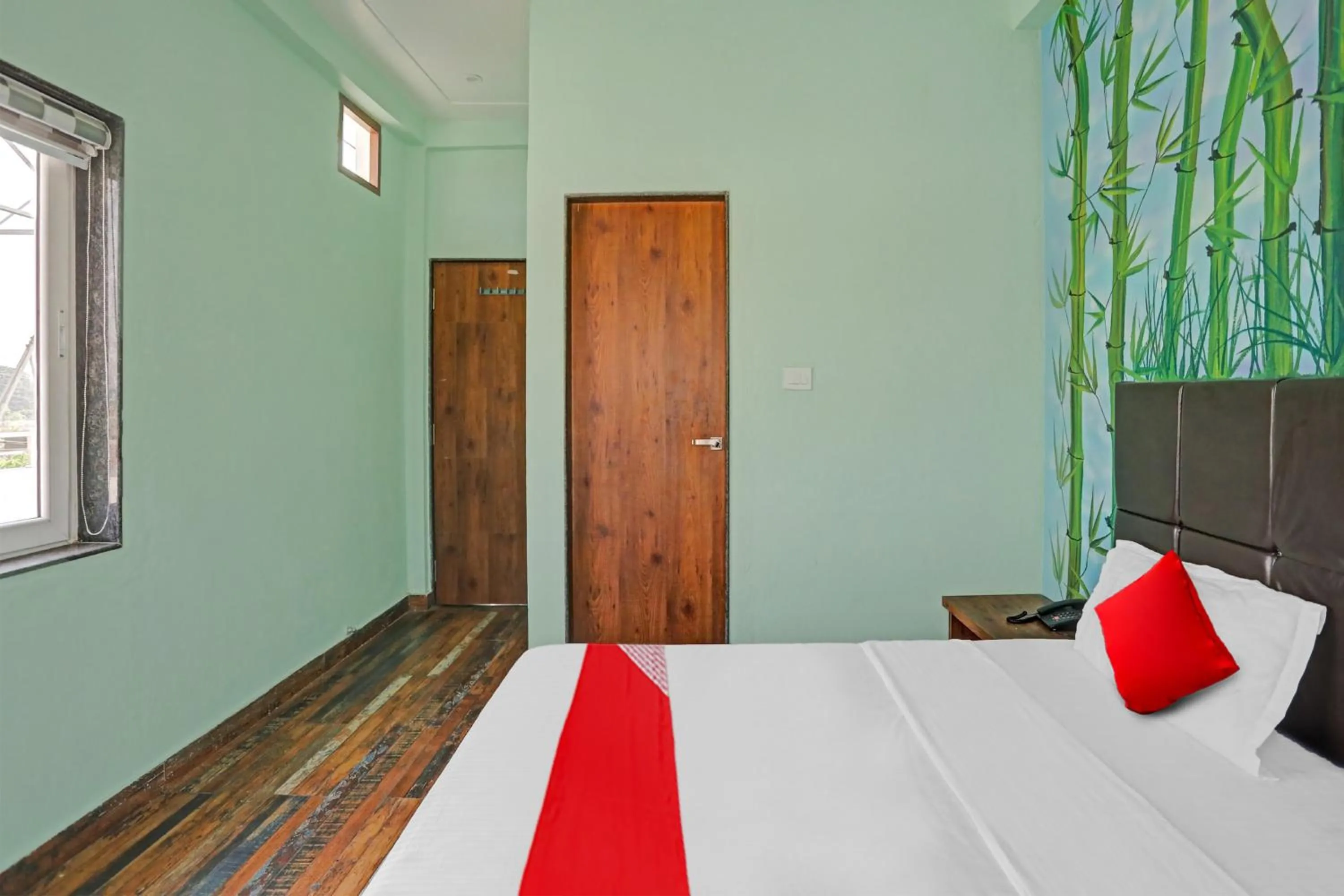 Bedroom, Bed in Hotel O MH Inn