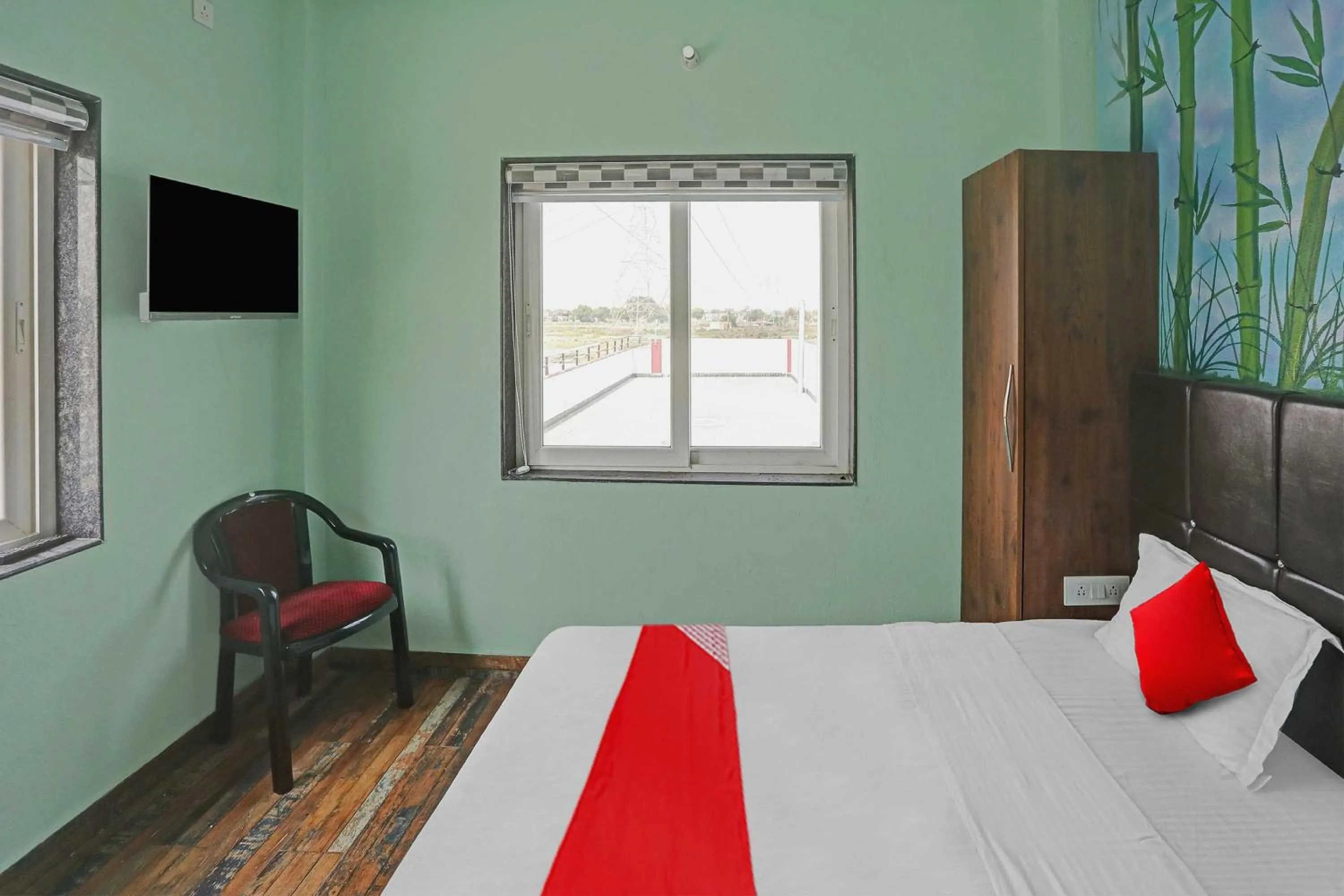 Bedroom, Bed in Hotel O MH Inn