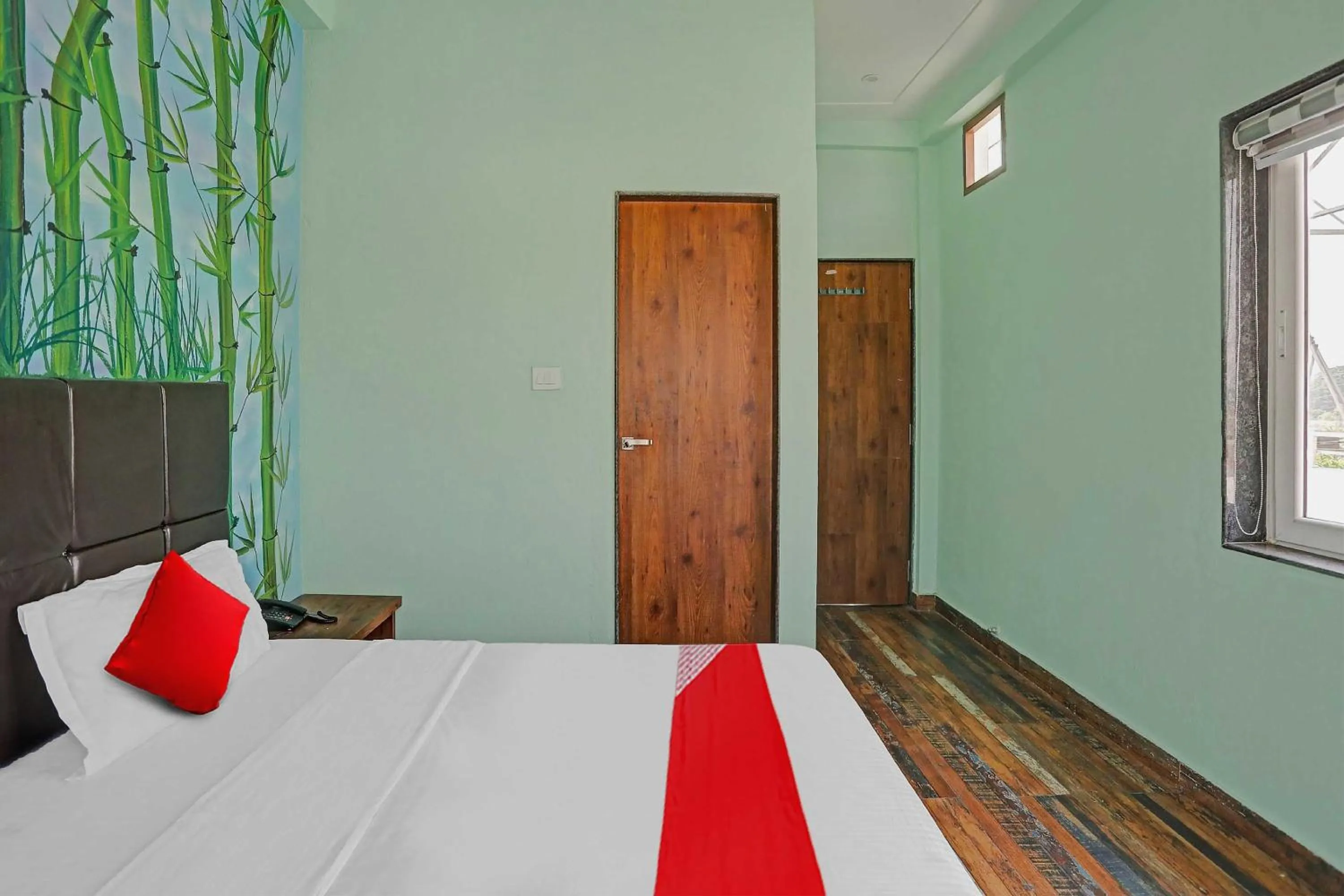 Bedroom, Bed in Hotel O MH Inn