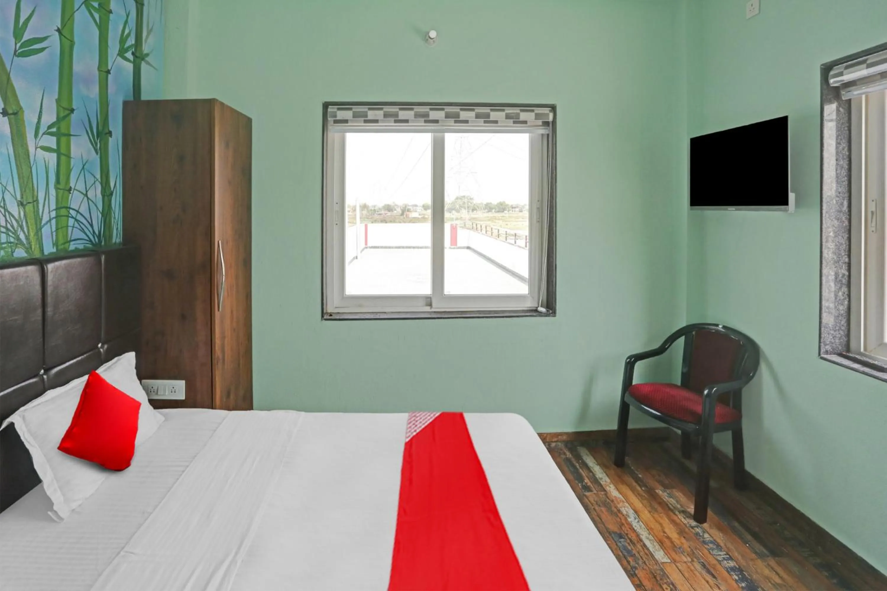 Bedroom, Bed in Hotel O MH Inn