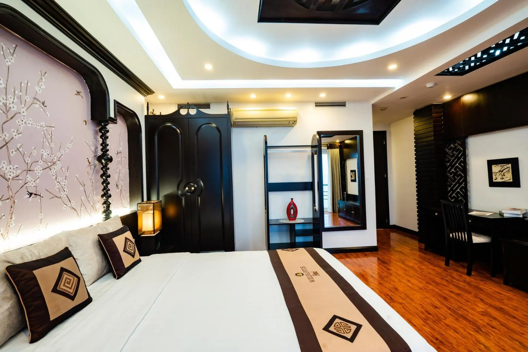 Bed in Wild Lotus Hotel Apartment 2