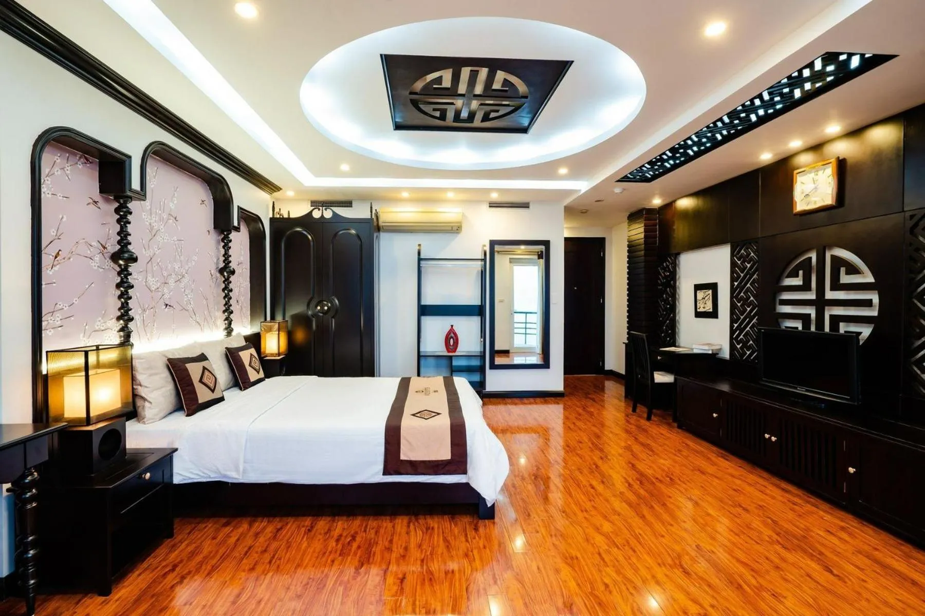 Bed in Wild Lotus Hotel Apartment 2