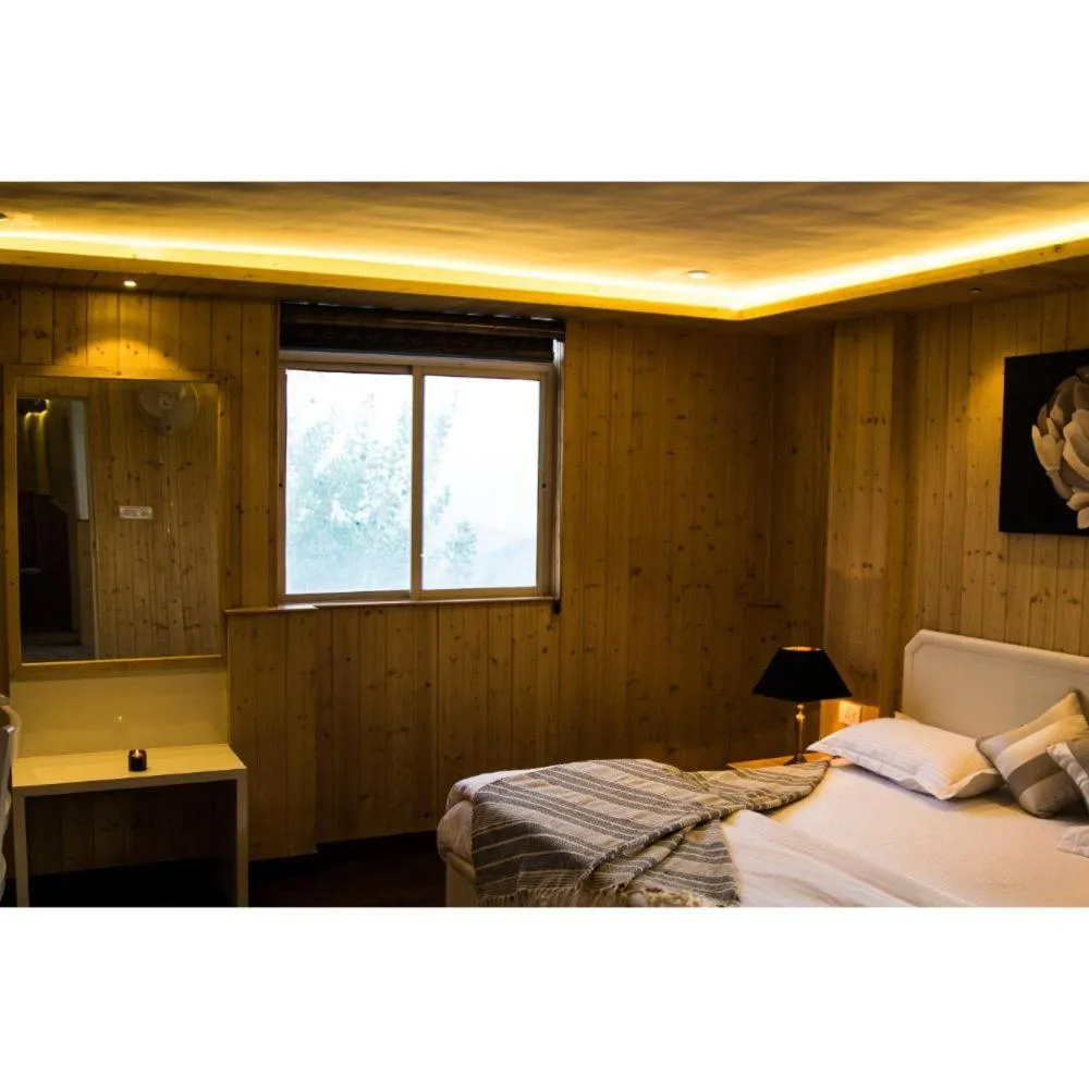 Photo of the whole room, Bed in Kaffberry Cafe & Homestays