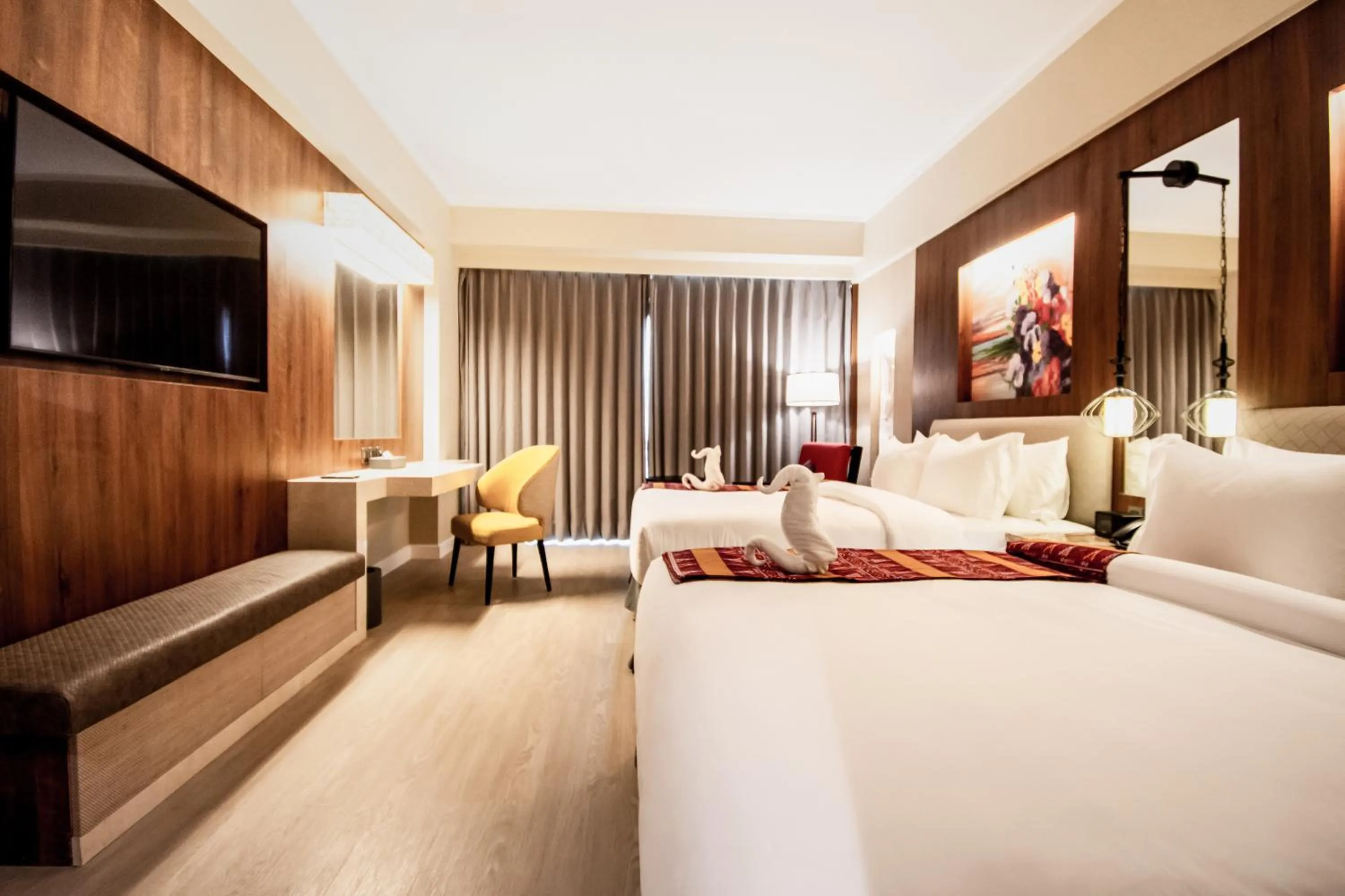 Bed in Mandarin Bay Resort and Spa