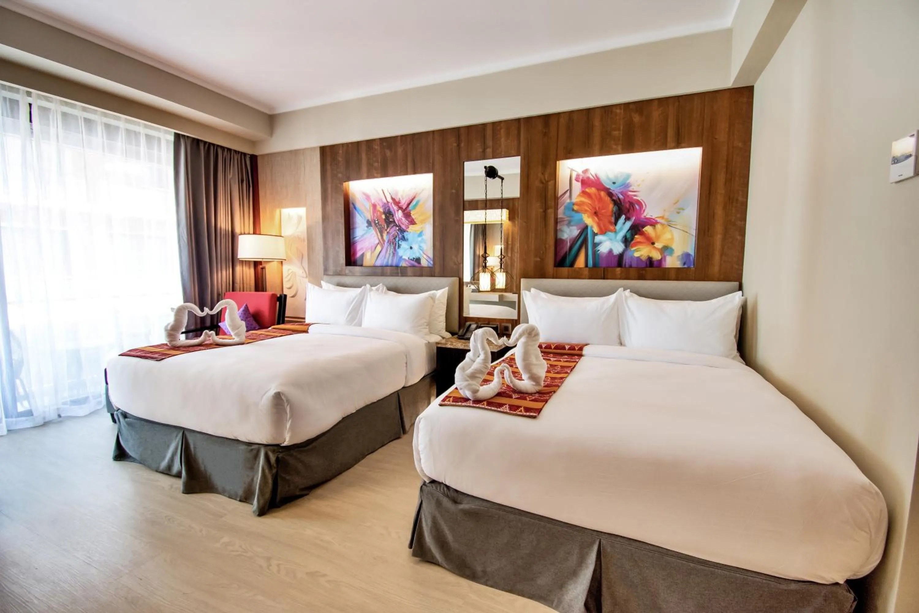 Bed in Mandarin Bay Resort and Spa