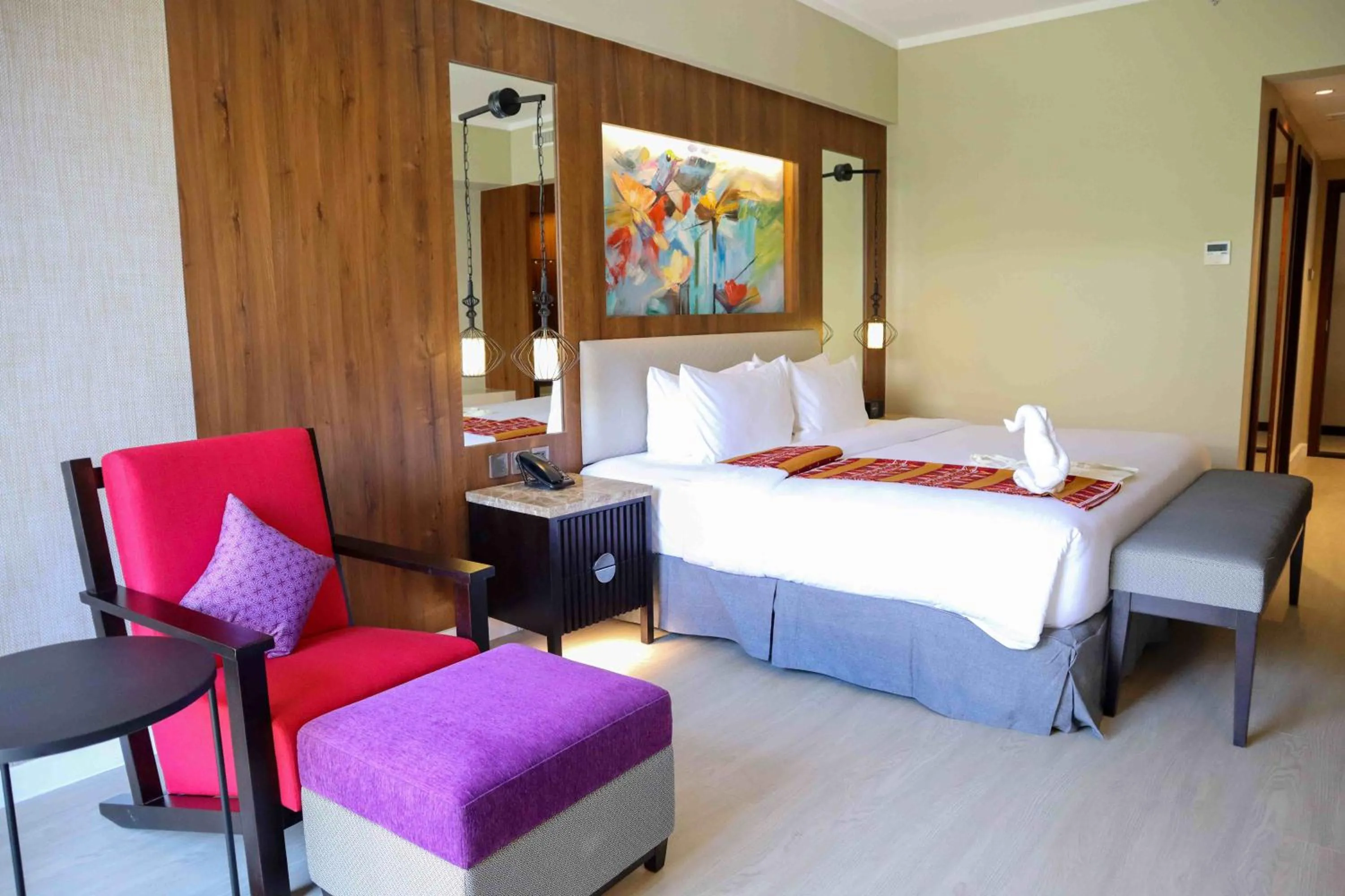 Bed in Mandarin Bay Resort and Spa