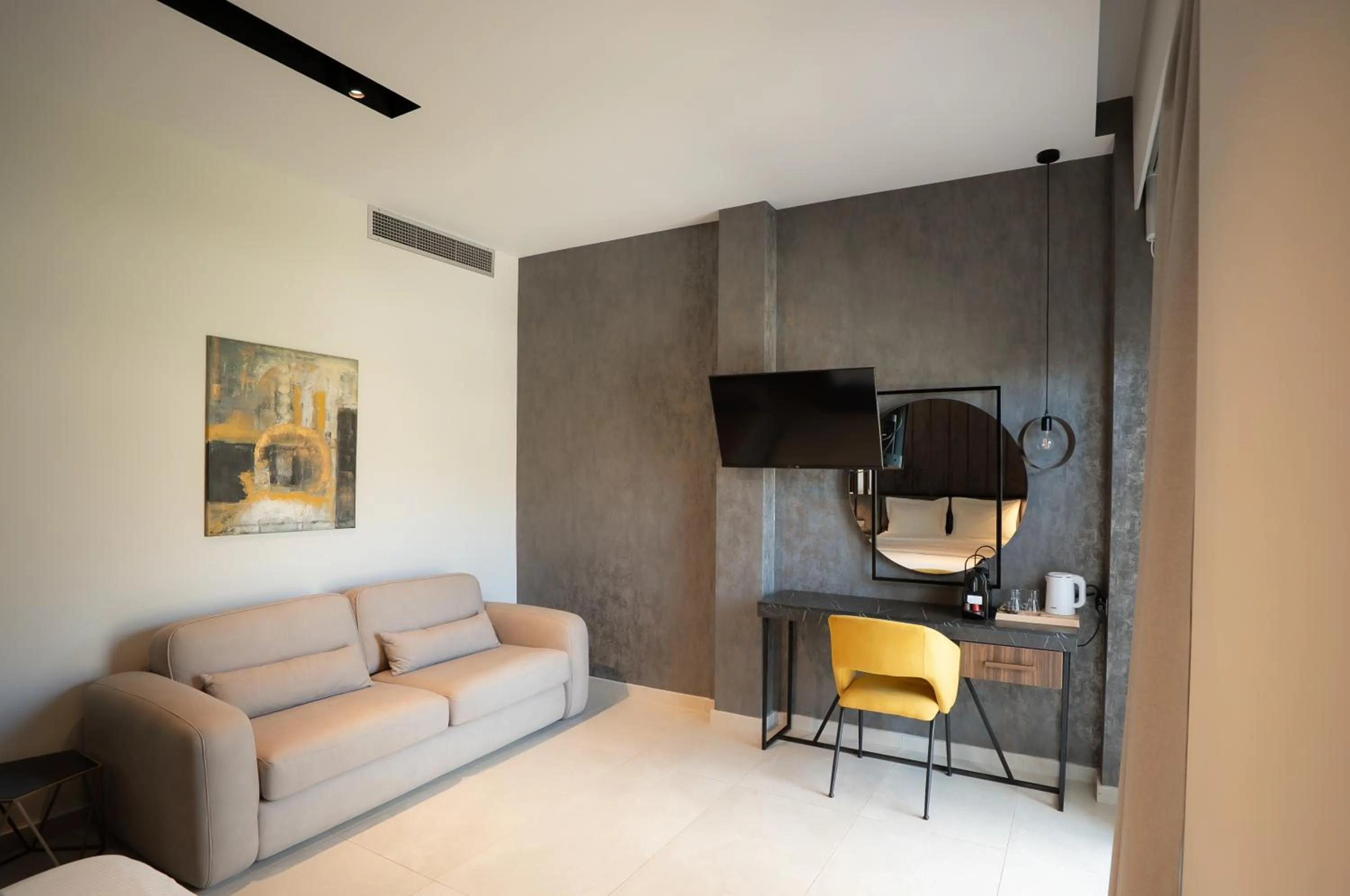 Seating area in Mirabilis Boutique Hotel by Panel Hospitality