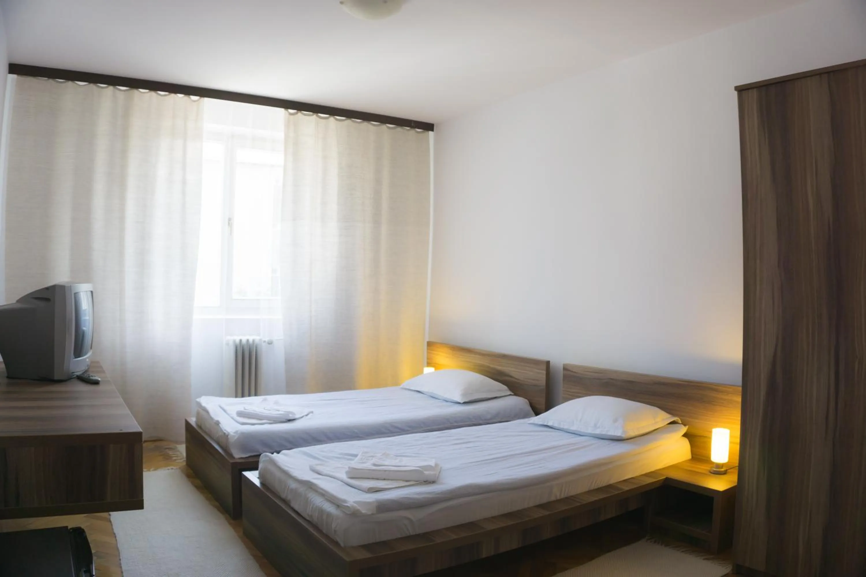 Bedroom, Bed in Hotel Merkur