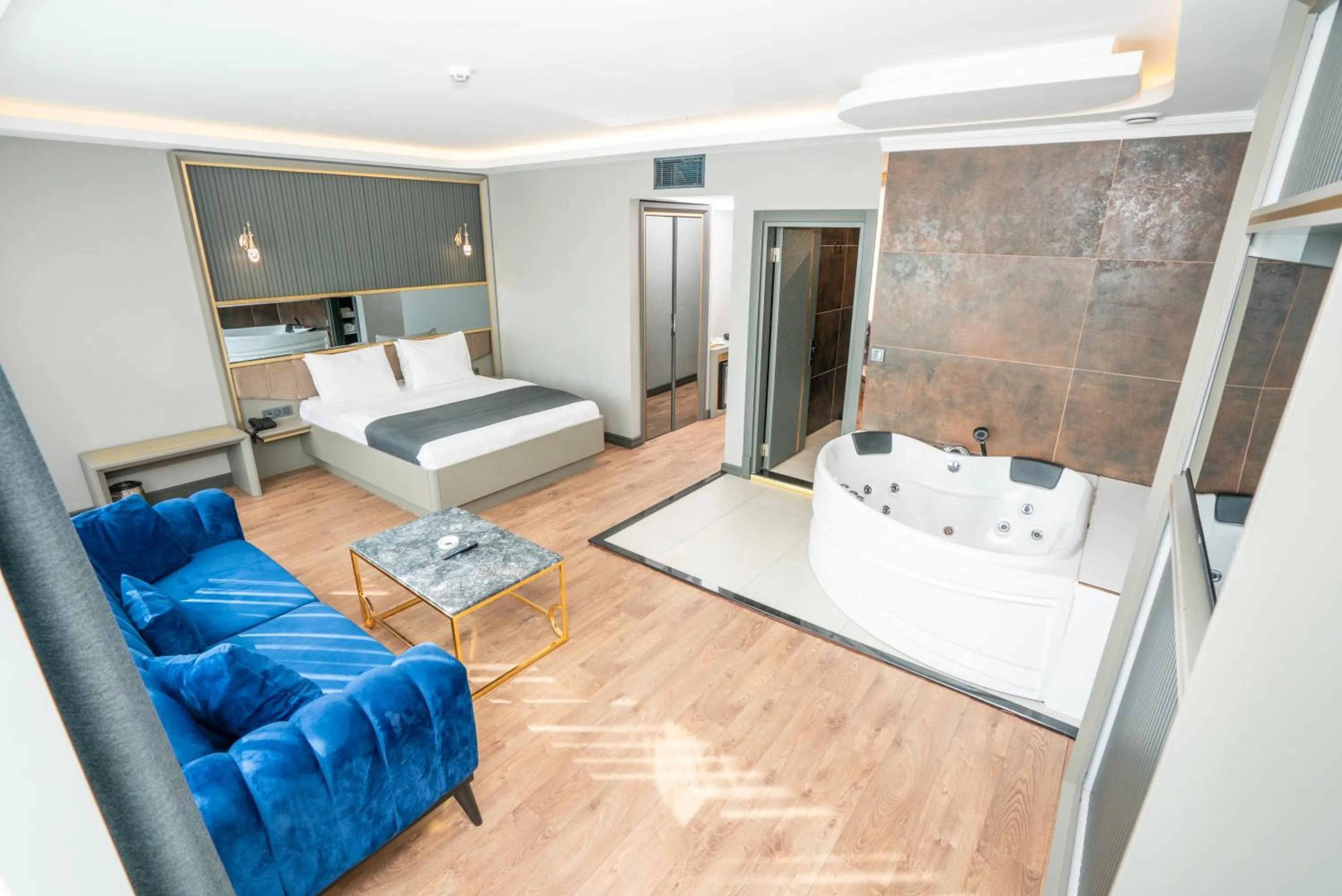 Living room, Bed in 216 Ruby Suite