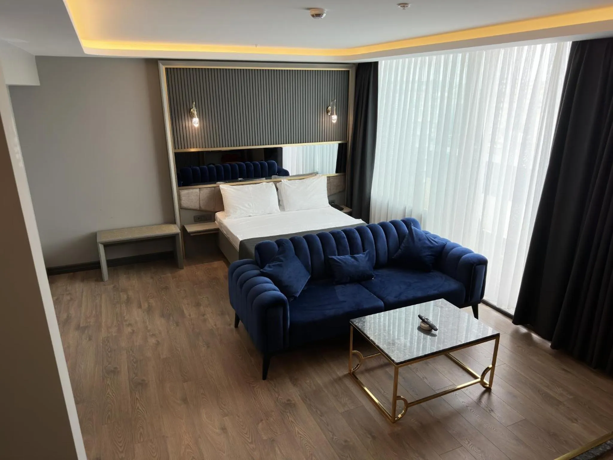 Photo of the whole room, Bed in 216 Ruby Suite