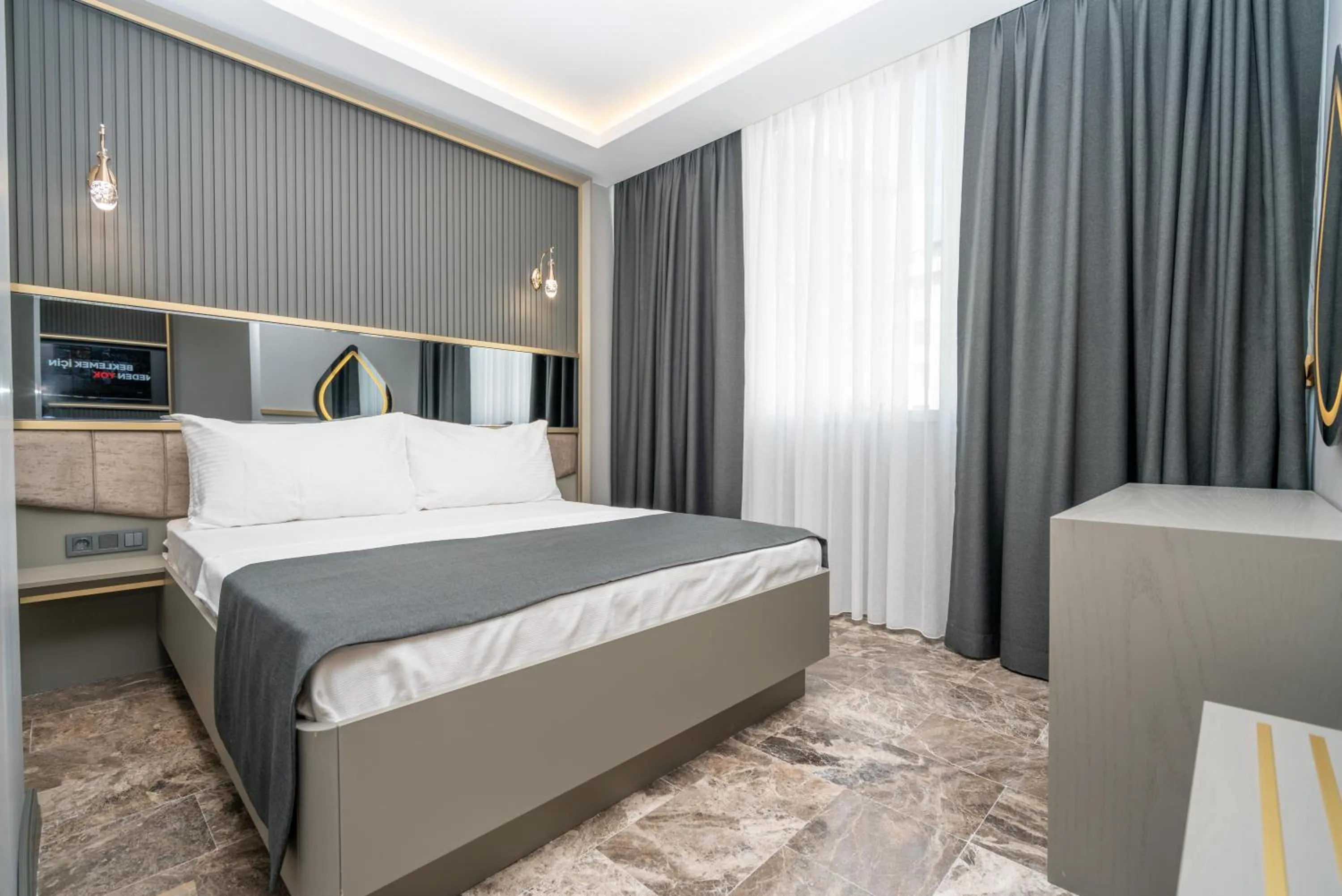 Bed in 216 Ruby Suite