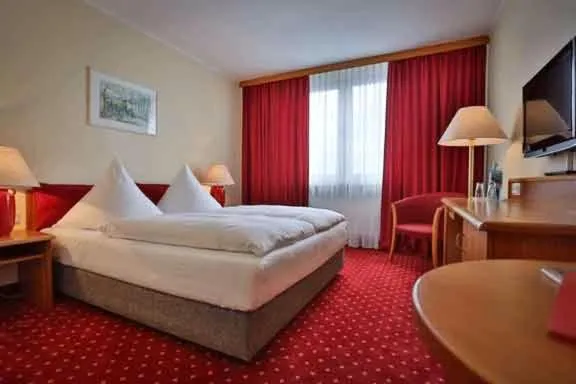 Photo of the whole room, Bed in Hotel Rosenstadt & Malxestube Restaurant