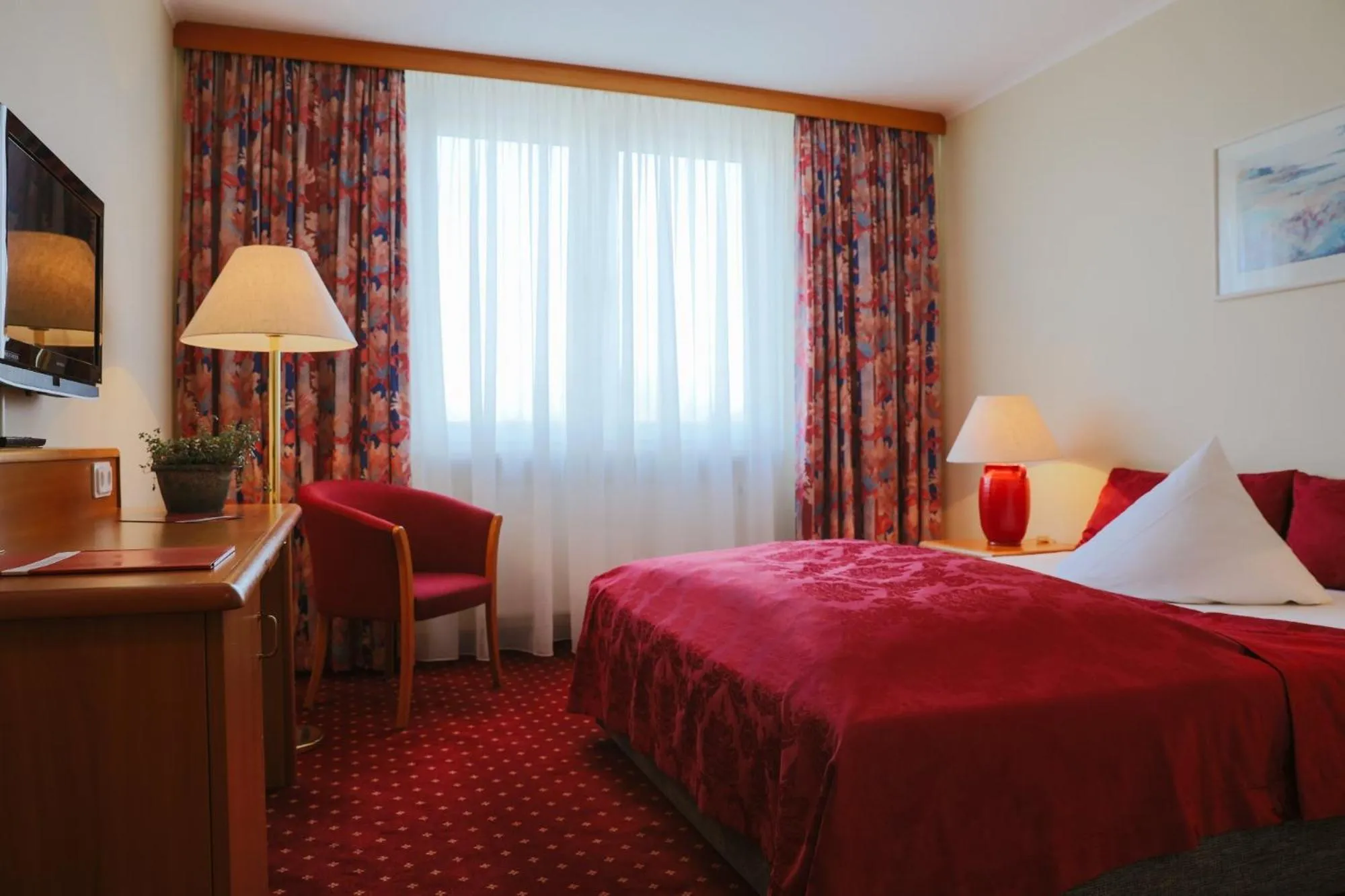 Photo of the whole room, Bed in Hotel Rosenstadt & Malxestube Restaurant