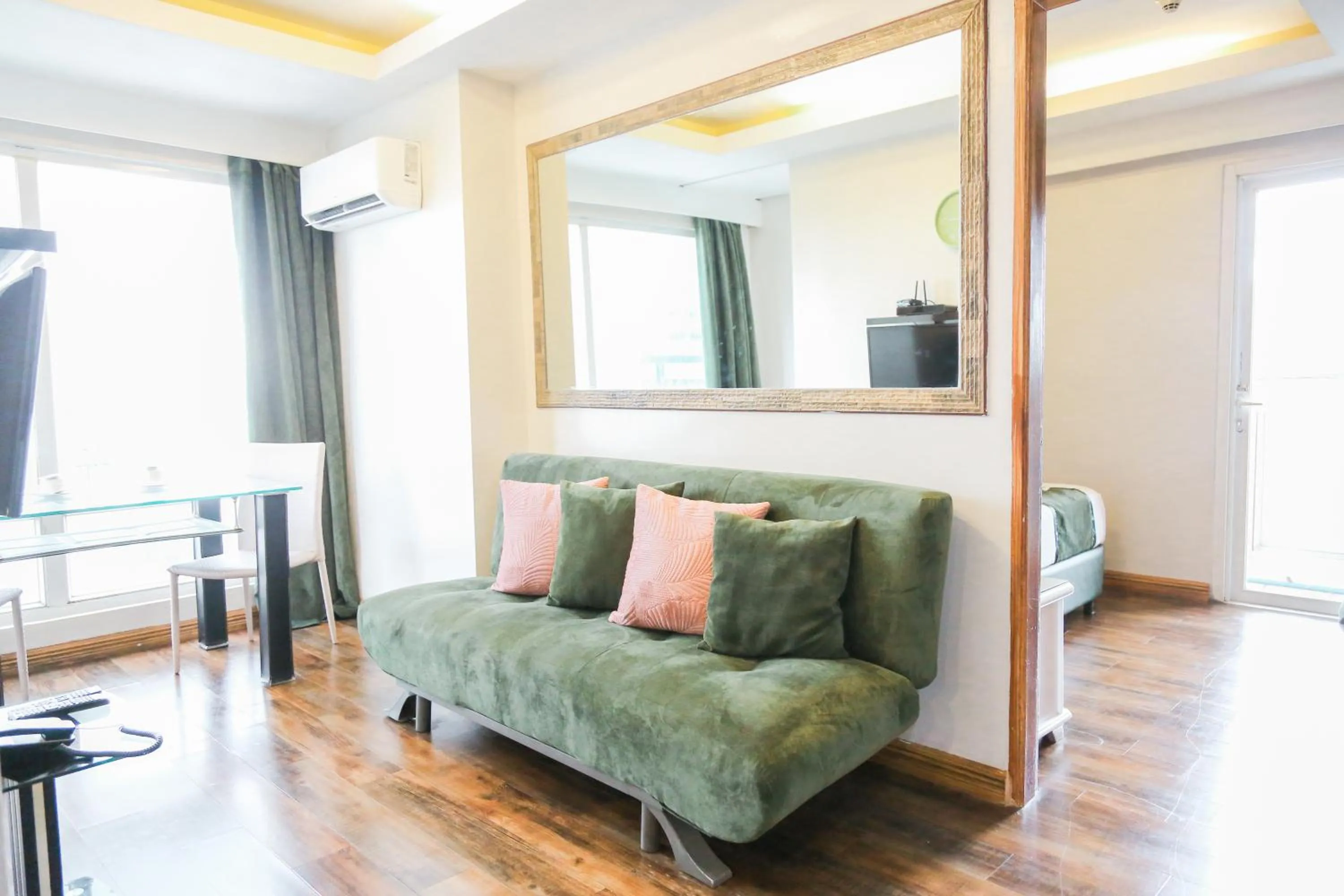 Seating area in Pacific Bay Grand Suites