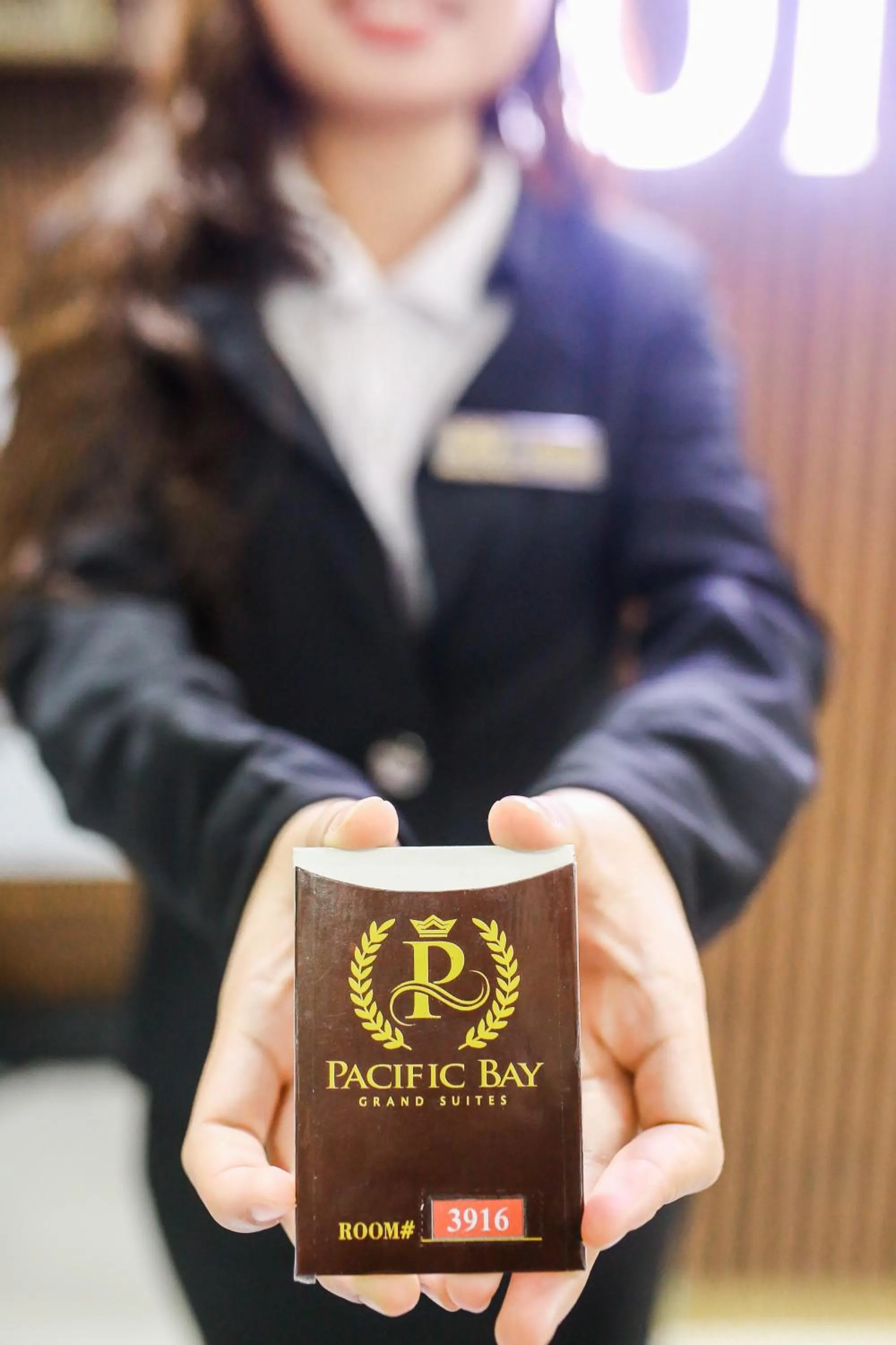 Property logo or sign in Pacific Bay Grand Suites