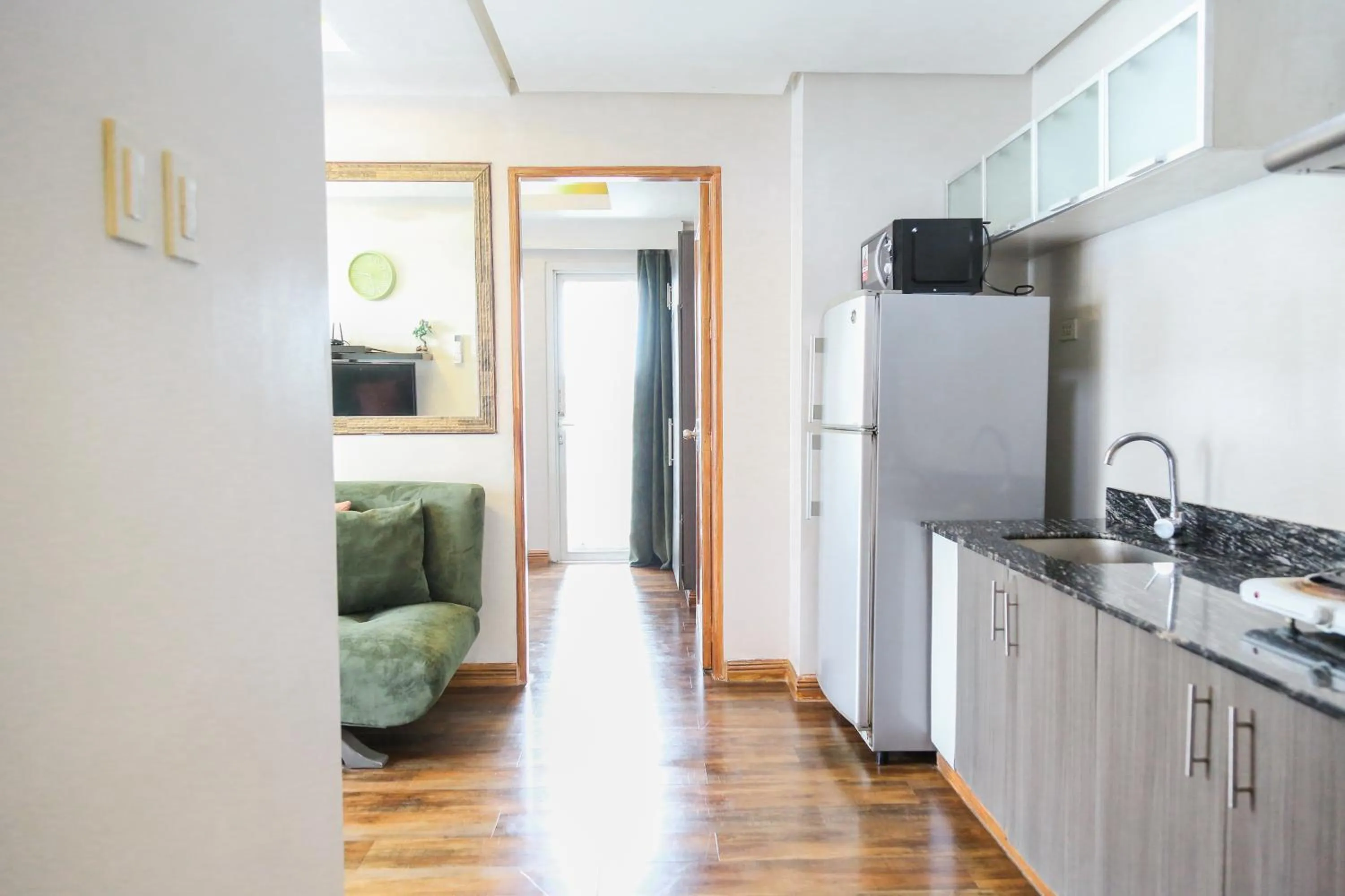 Kitchen or kitchenette in Pacific Bay Grand Suites