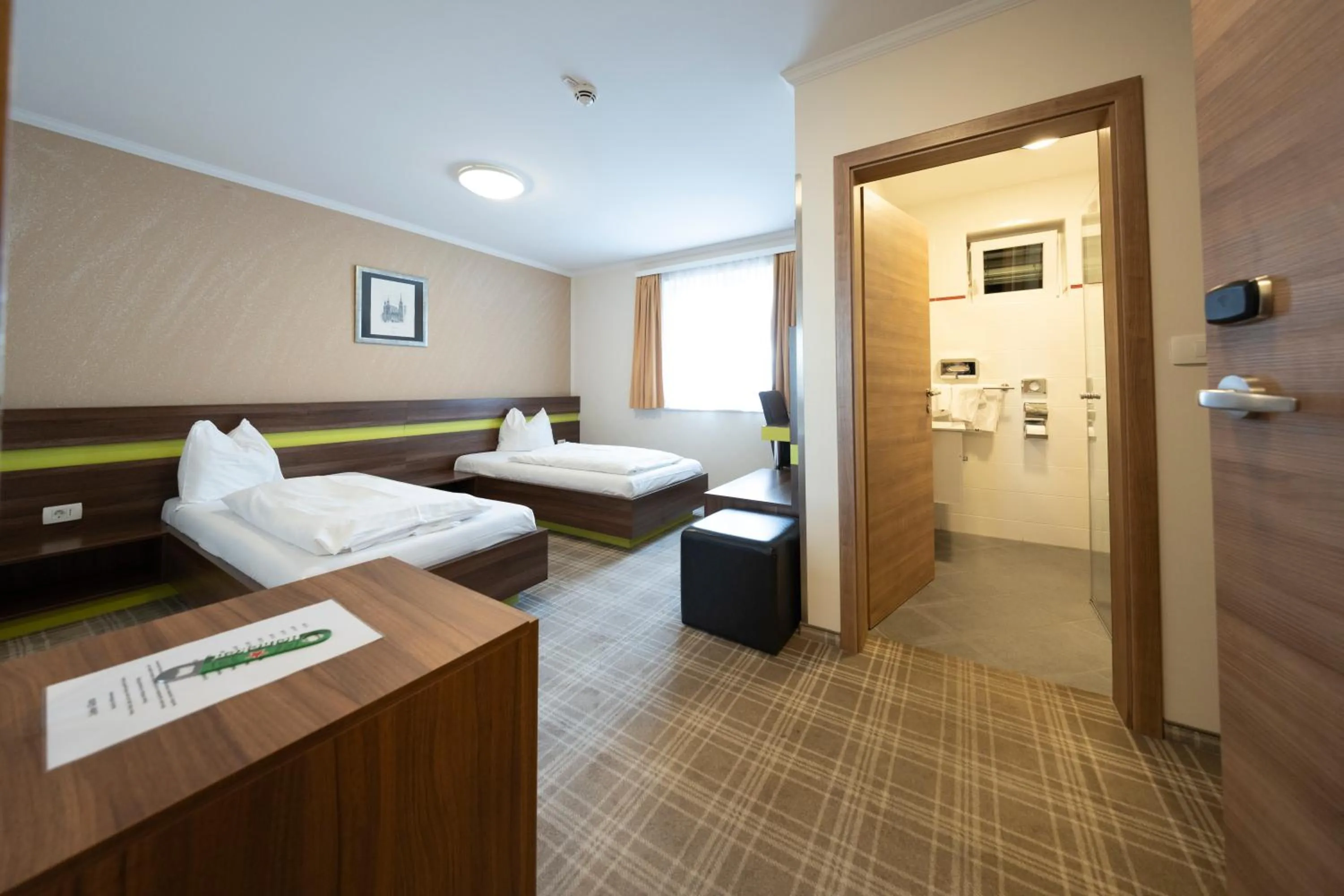 Bed in Primus Hotel & Apartments